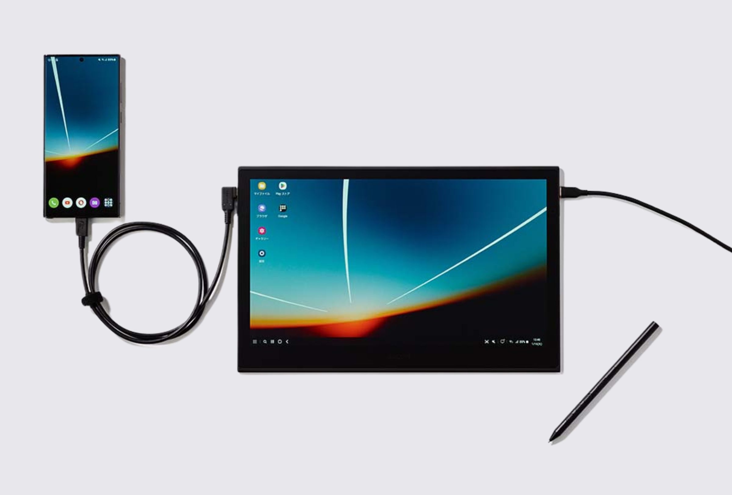 The Wacom Movink 13 drawing tablet connected to an Android phone.
