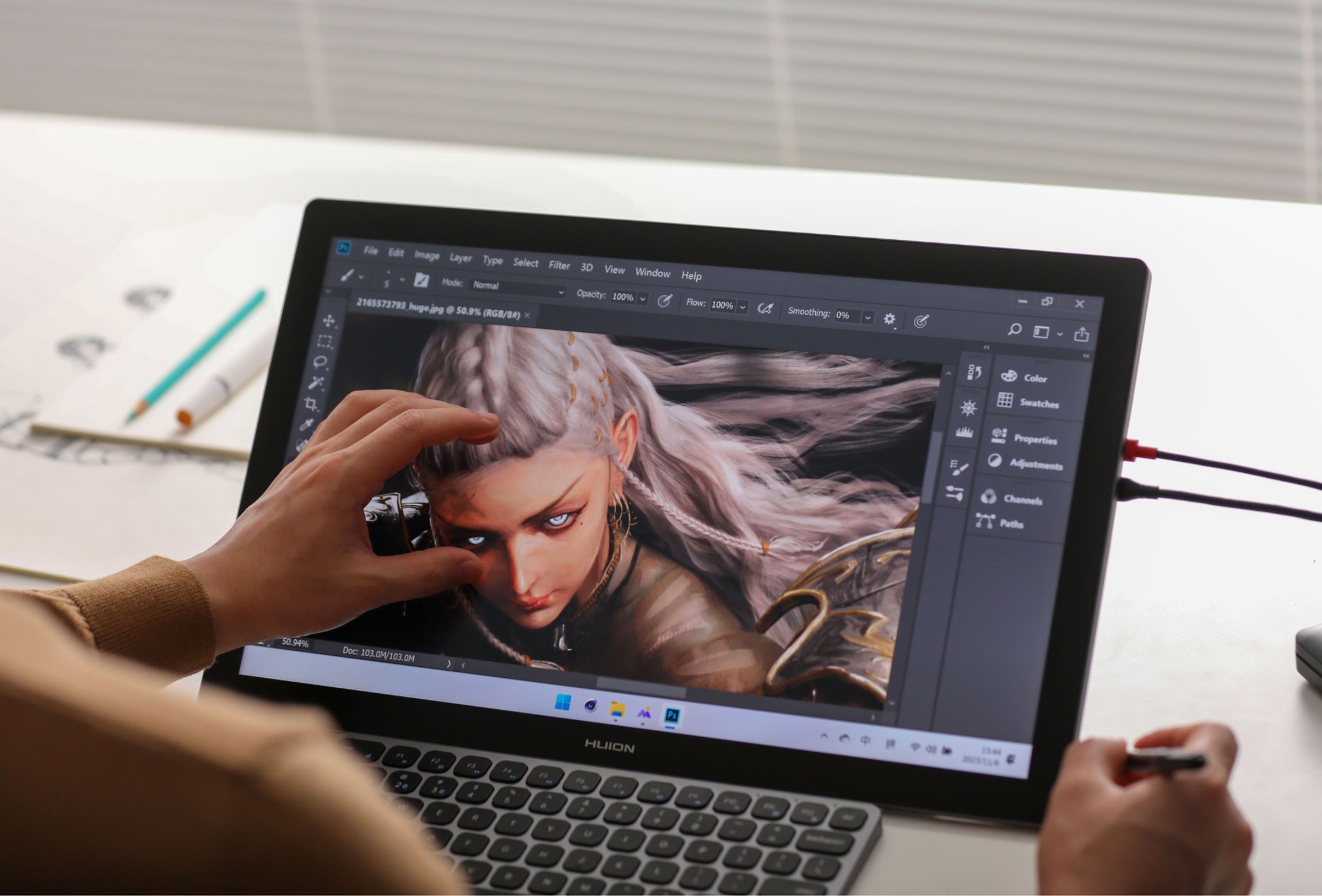The Huion Kamvas Pro 19 being used with touch control support.