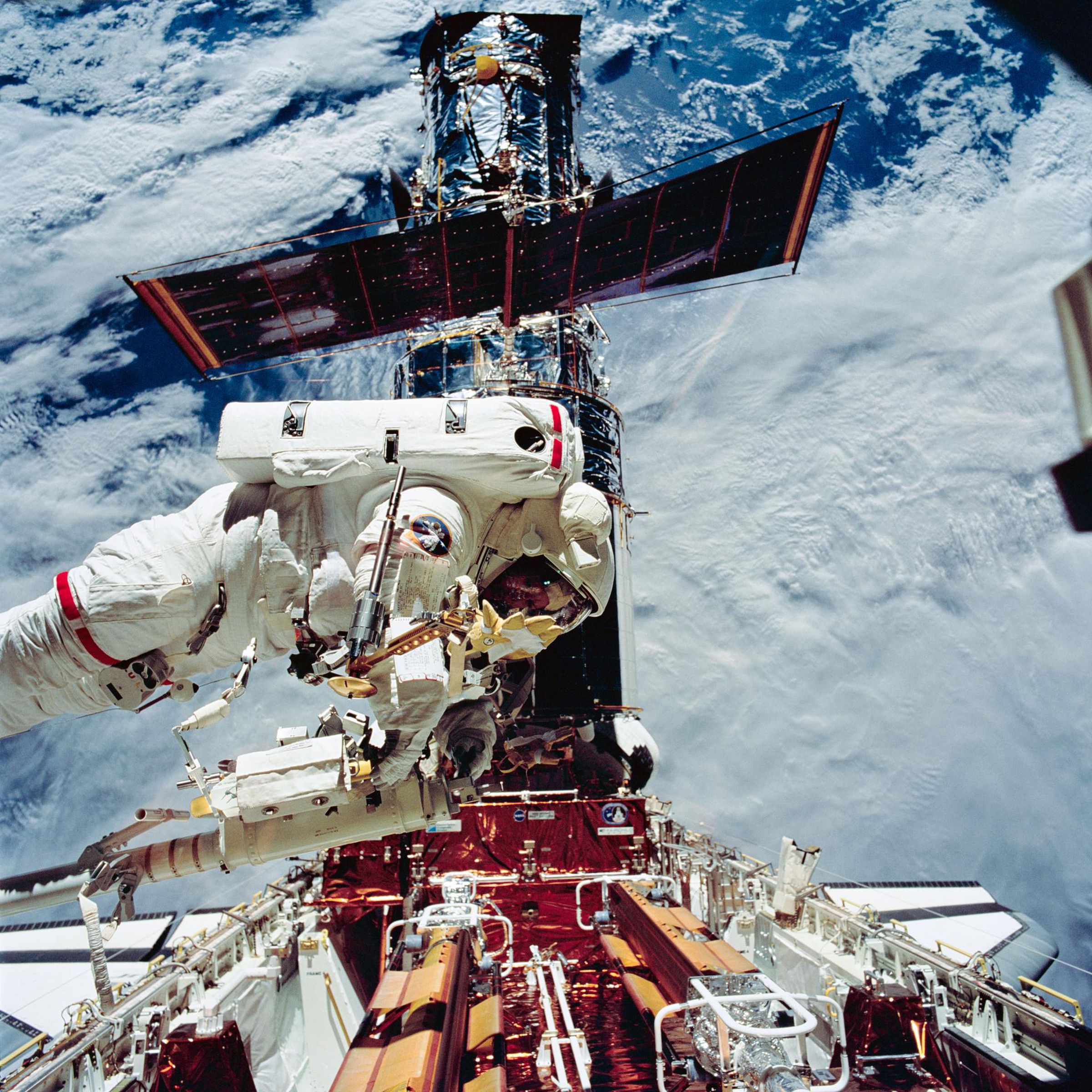 Astronaut Kathryn Thornton on a spacewalk to repair the Hubble Space Telescope in 1993