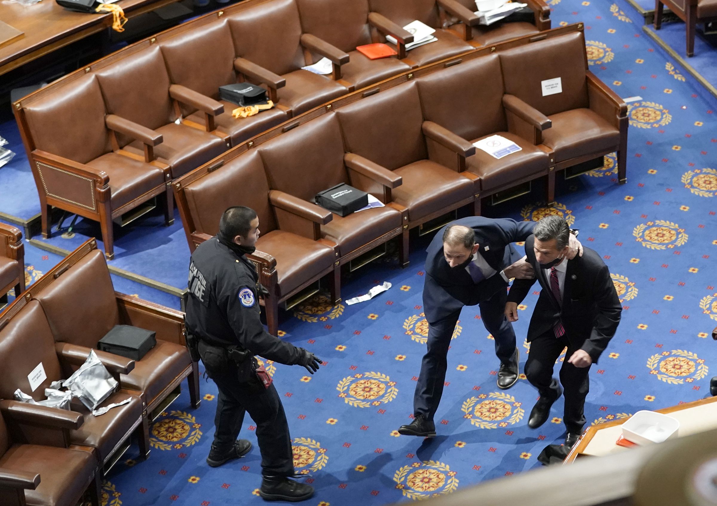 Lawmakers were directed to shelter in place as the crowd attempted to breach the chamber.