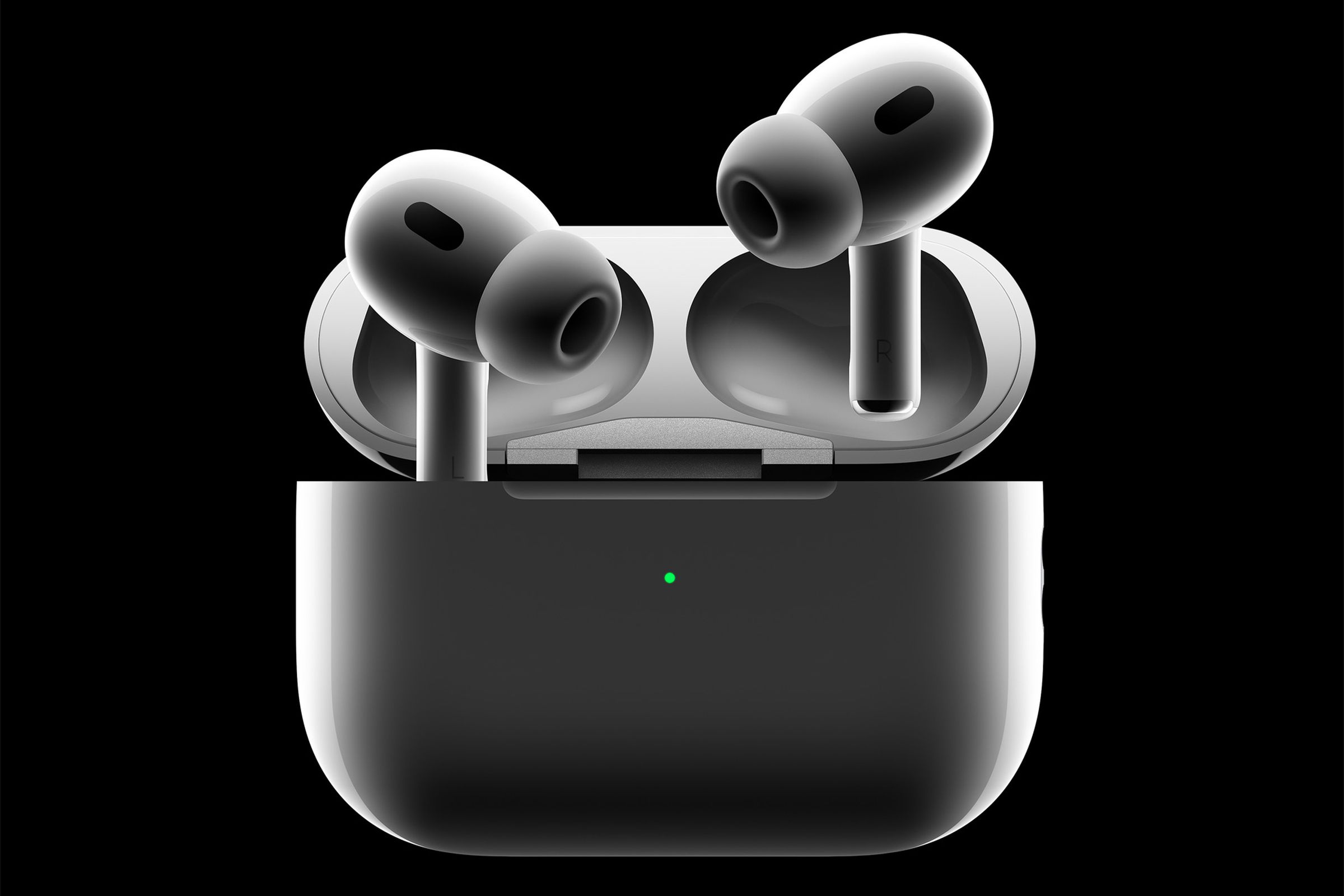 A promotional image of Apple’s second generation AirPods Pro on a black background. They look quite similar to the original AirPods Pro.