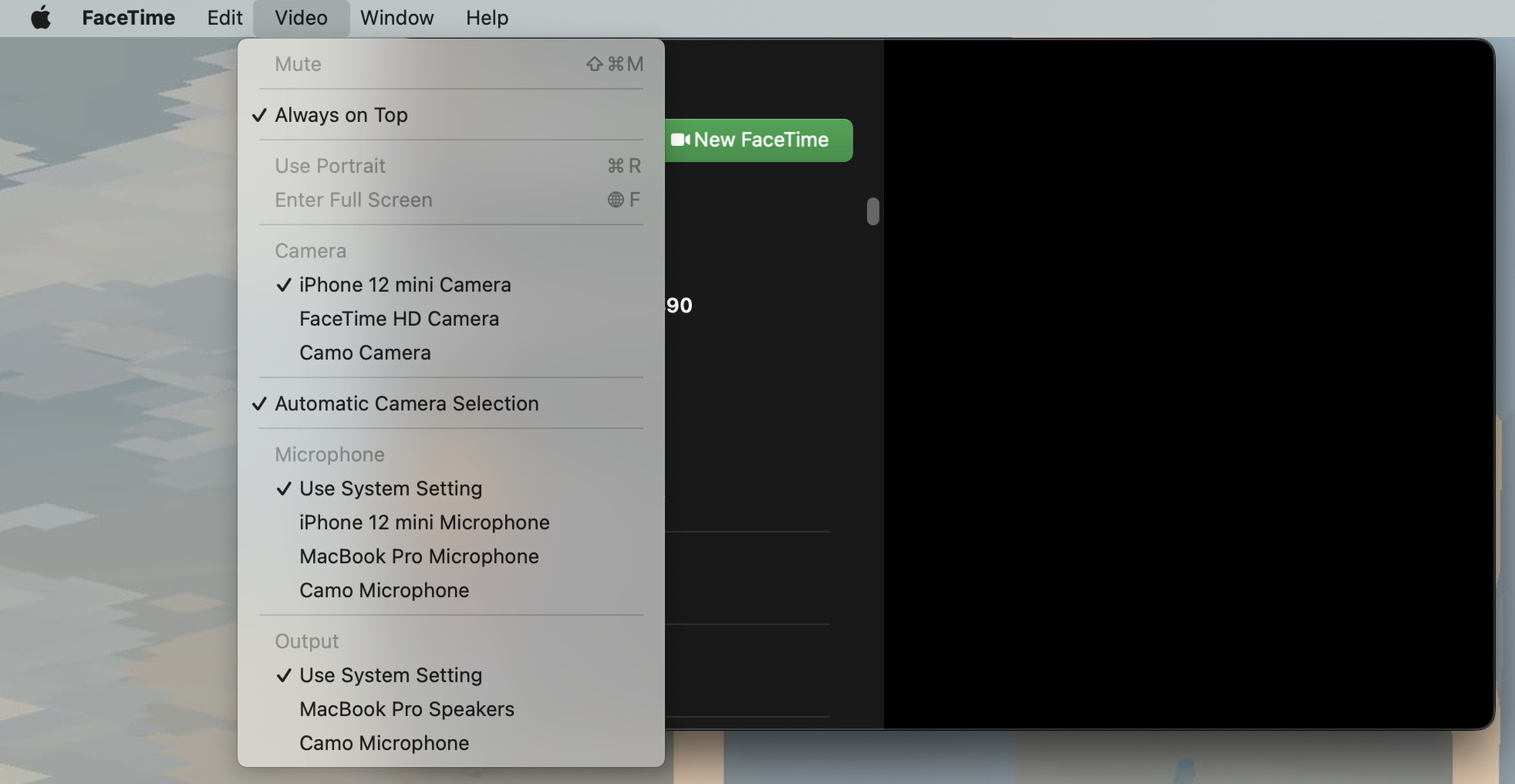 A screenshot of FaceTime in macOS Ventura. The Video drop-down menu is open with iPhone 12 Mini Camera selected.