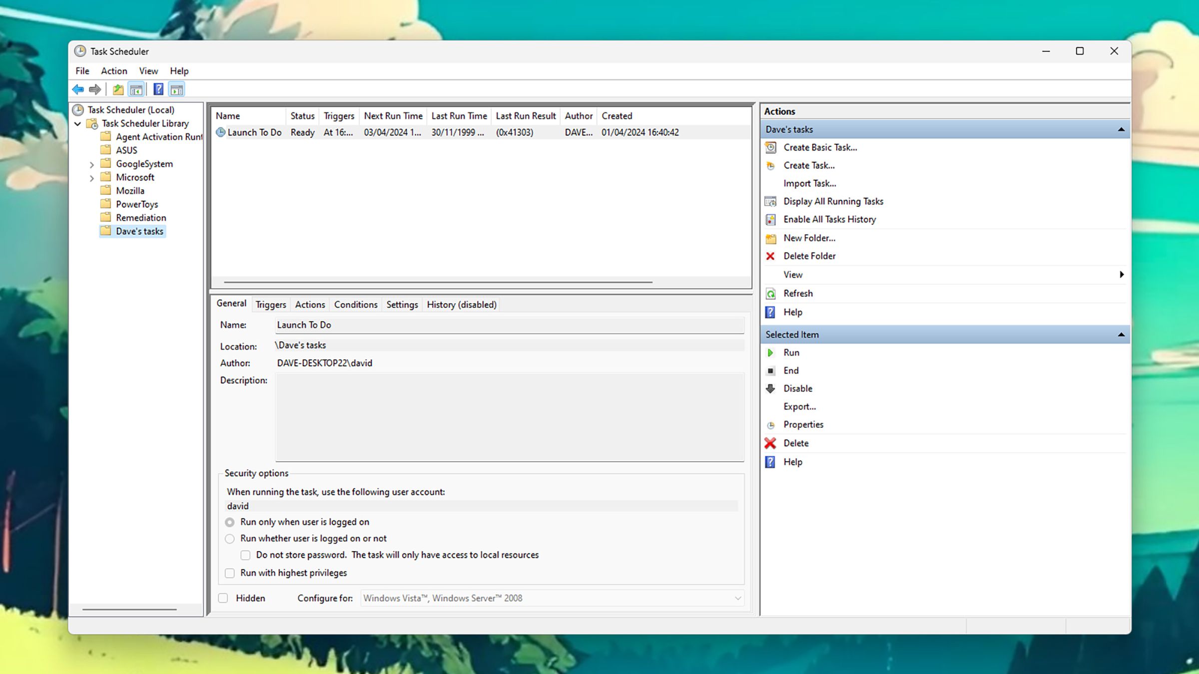 Windows screen with large Task Scheduler window; menu at left, boxes with various text messages in center, list of actions on right.
