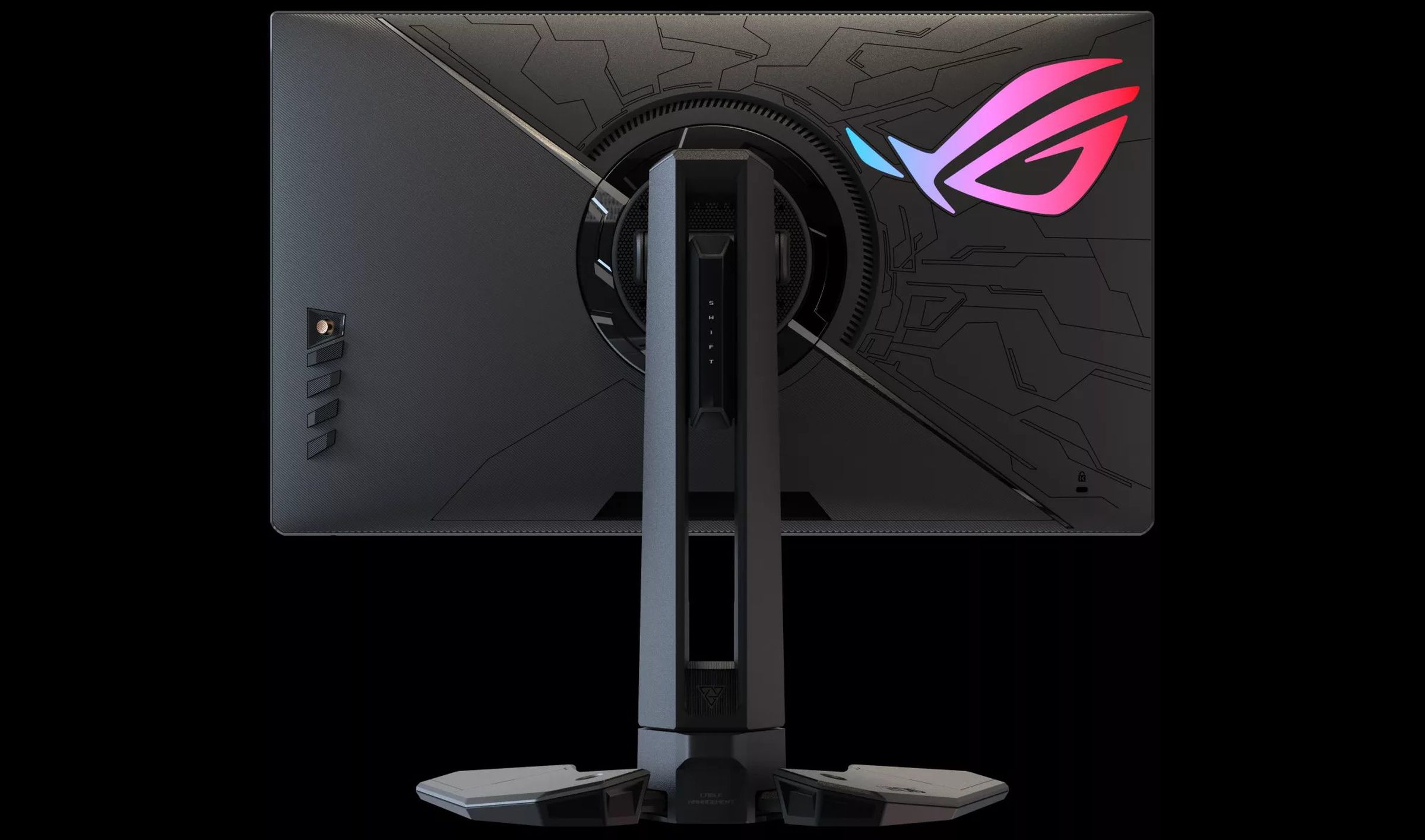 A gaming monitor with neon Asus ROG symbol, a bit like a butterfly’s iridescent wing.