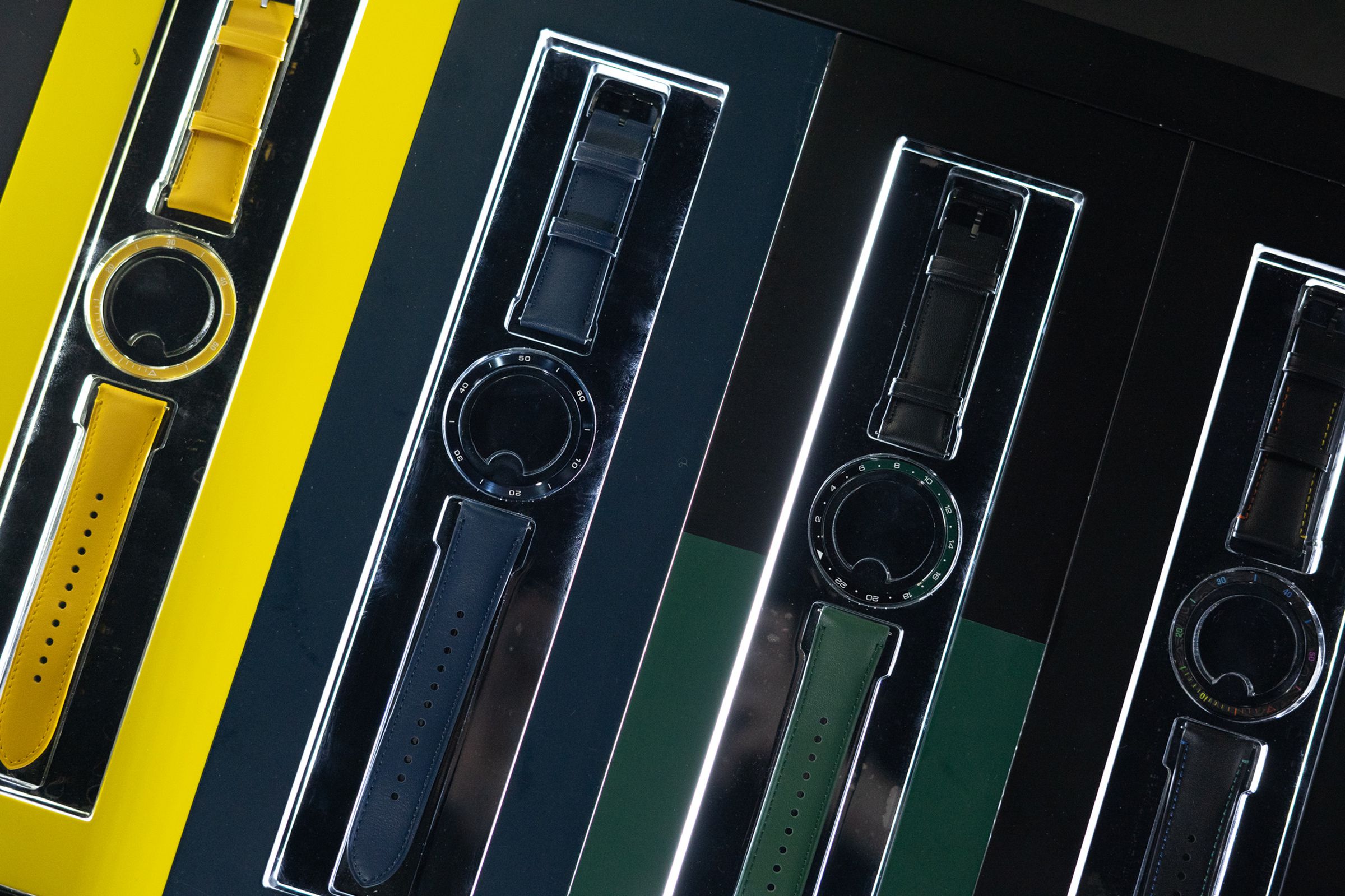 Xiaomi S3 straps and bezels in yellow, blue, green, and black.