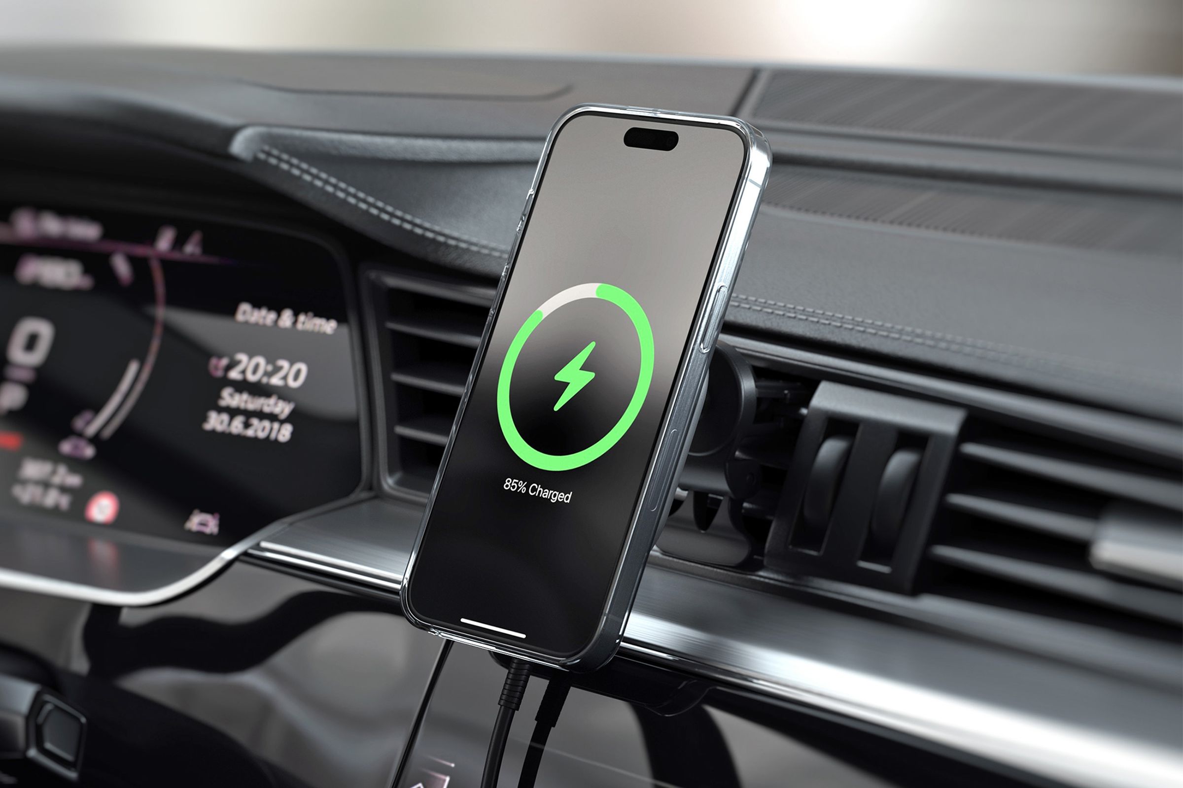 A smartphone attached to the Satechi Qi2 Wireless Car Charger.