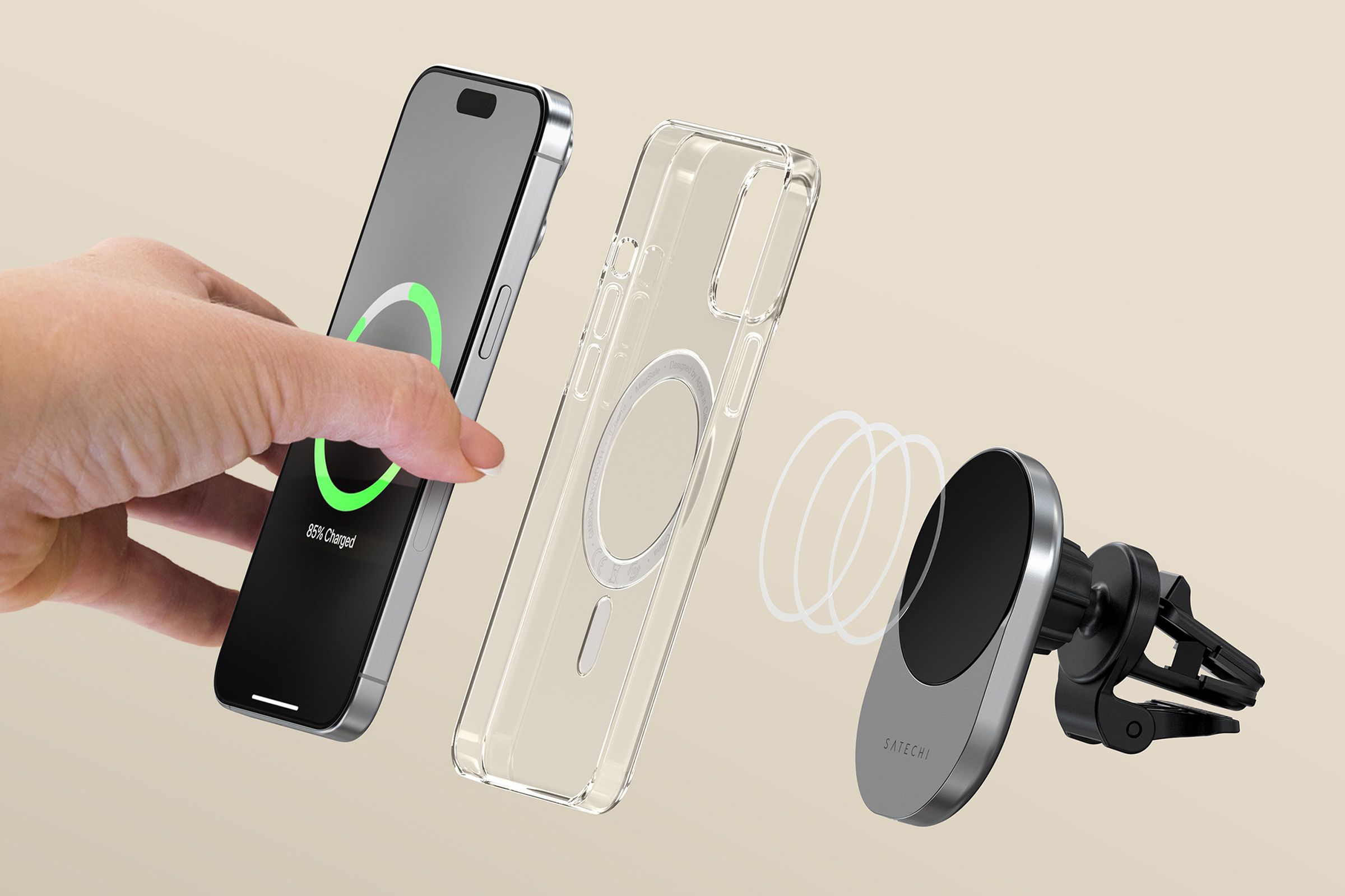 A smartphone being attached to the Satechi Qi2 Wireless Car Charger.