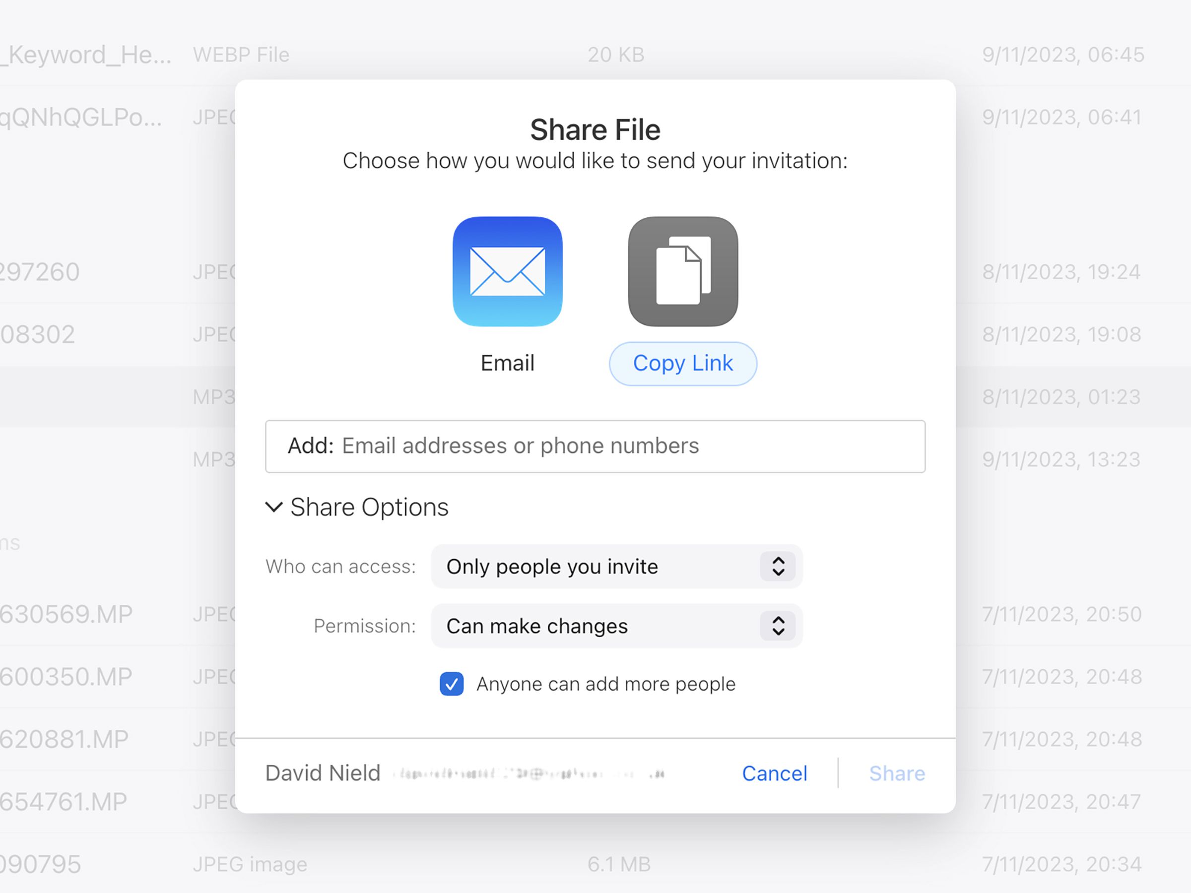 Pop-up box headed Share File, with icons for Email and Copy Like, a field for email addresses or phon numbers, and share options.