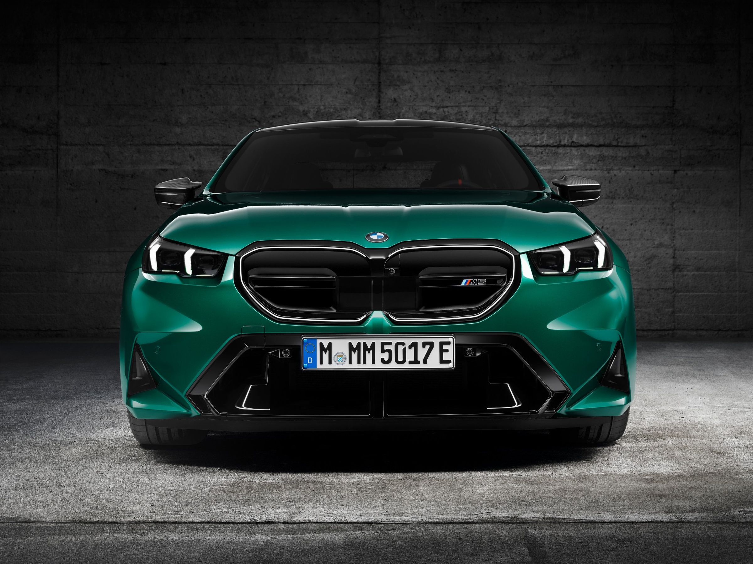 <em>The 2025 BMW M5 gets a plug.</em>