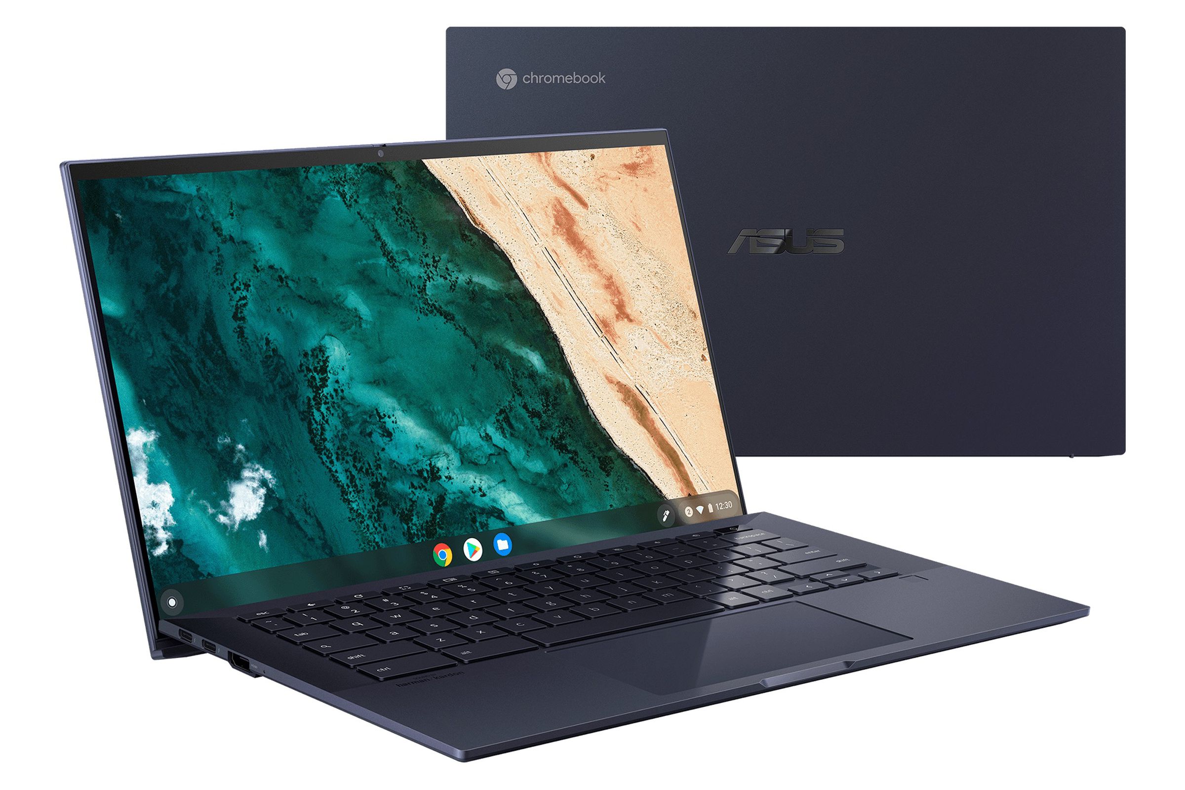 Two models of the Asus Chromebook CX9 sit perpendicular to each other. The one facing the camera displays a birds-eye view of a shoreline.