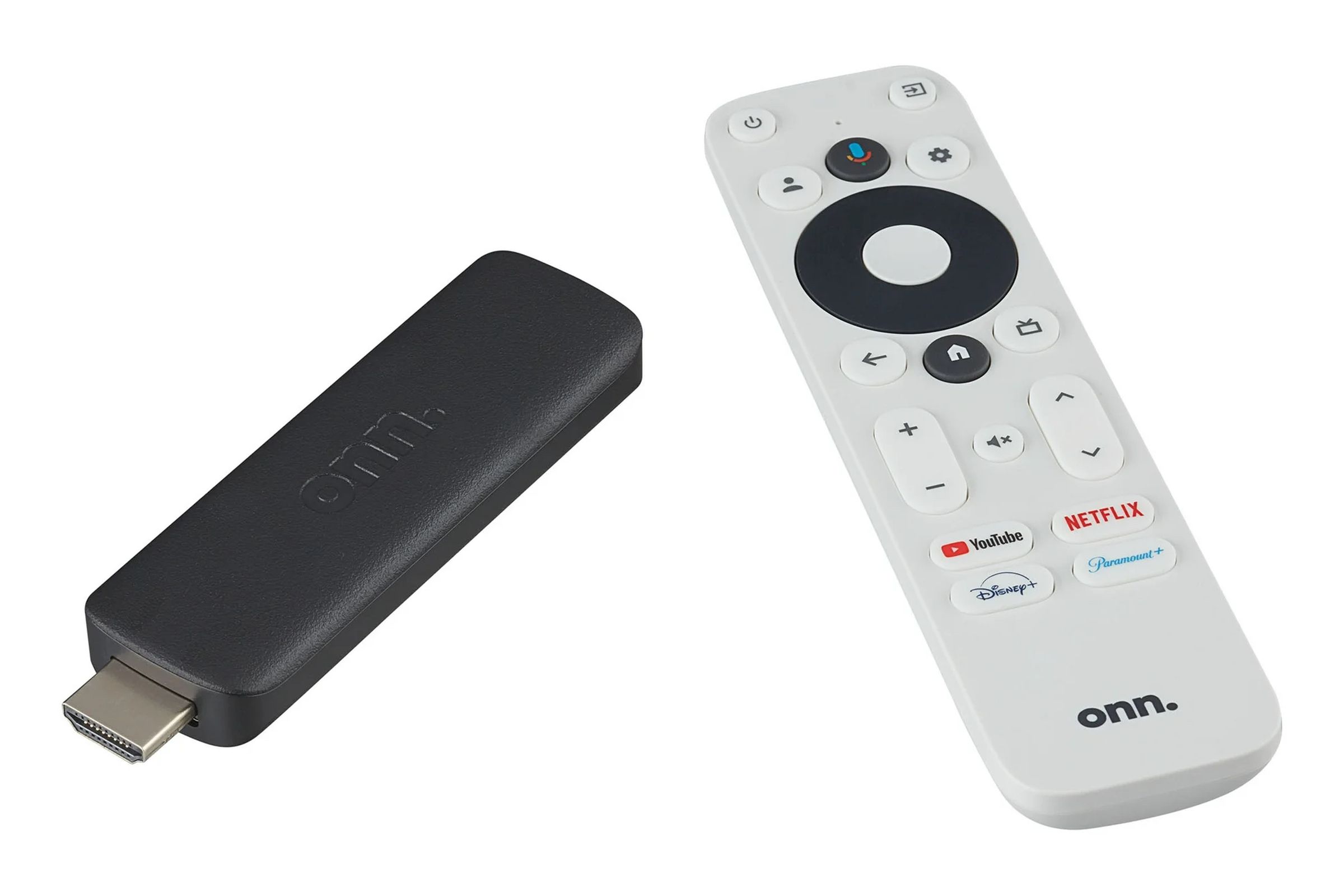 A black streaming stick and a white remote control