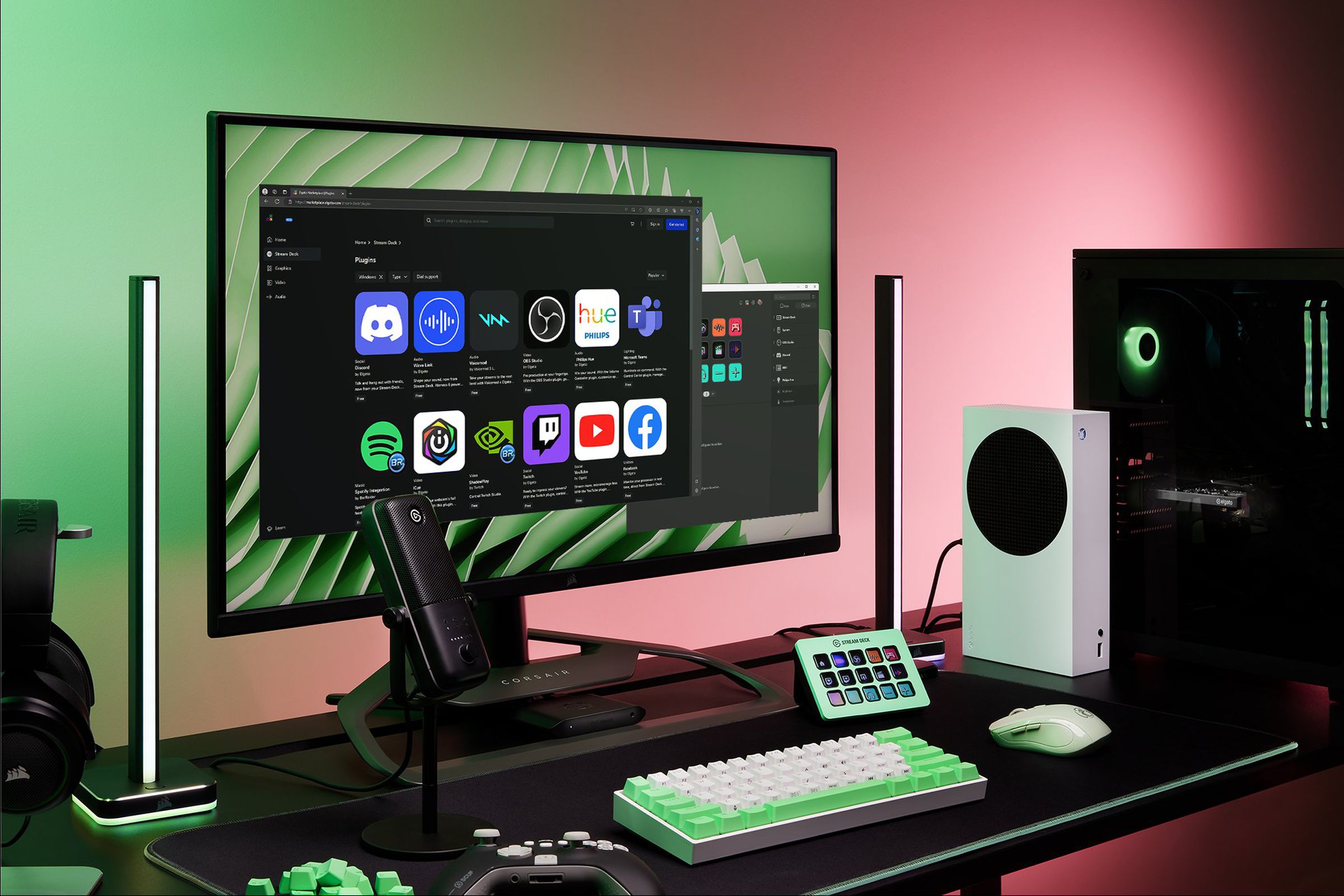 Desktop PC setup shown with gaming devices and hardware for a streamer like a microphone and lighting. On the computer screen there’s a simulated image of the Stream Deck software, and the new Elgato Marketplace with plugins for apps like Discord, Microsoft Teams, and Twitch.