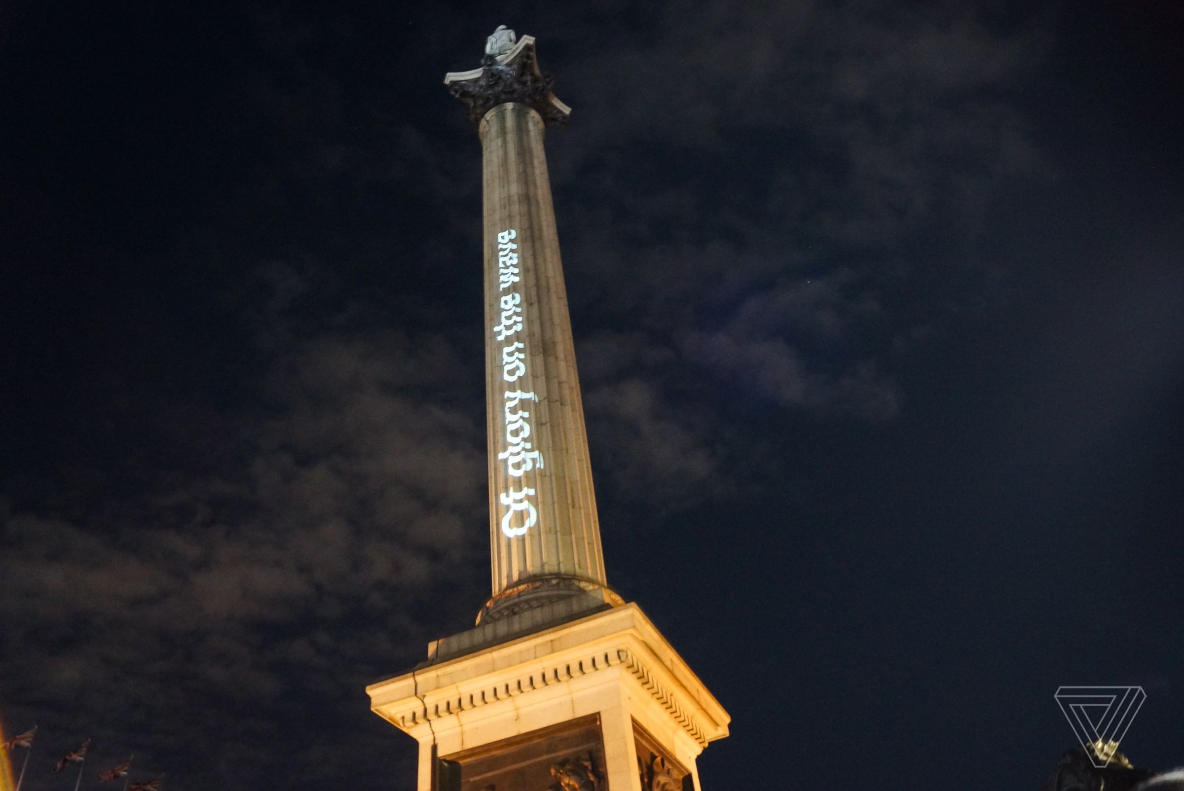 The AI poetry is projected onto Nelson’s Column. 
