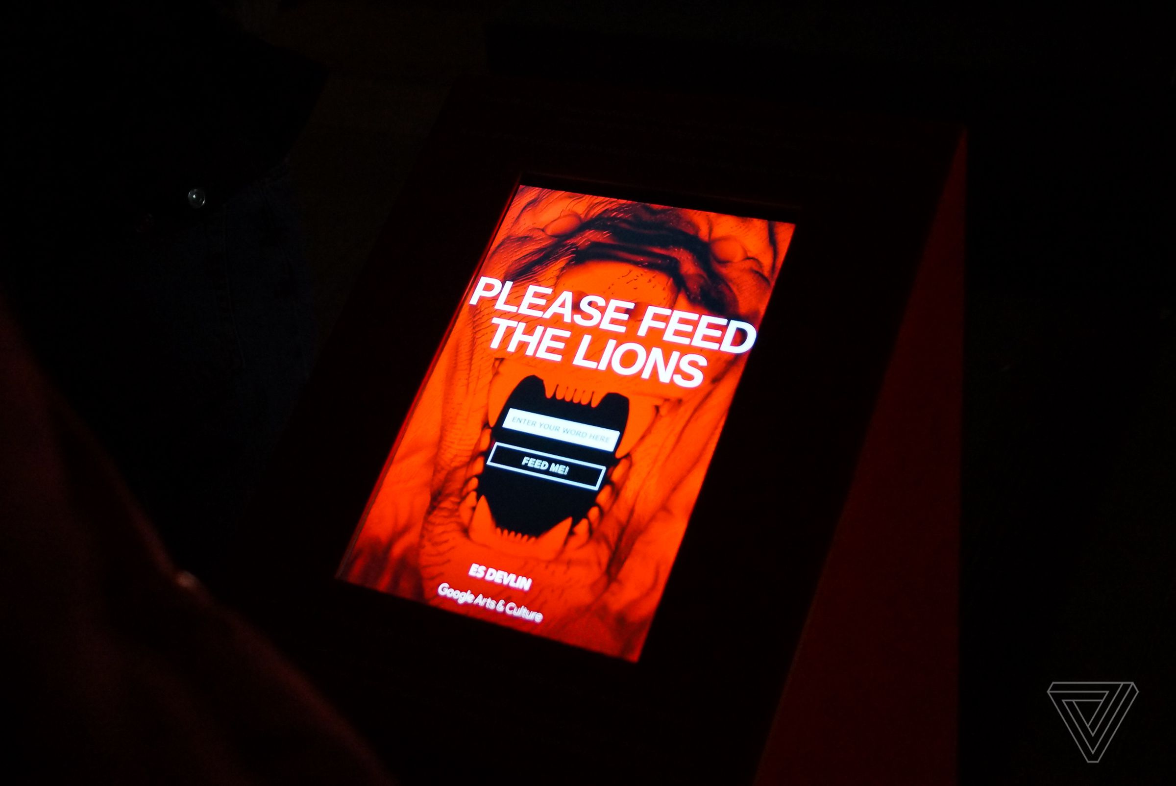 You “feed” the lion words using a tablet.