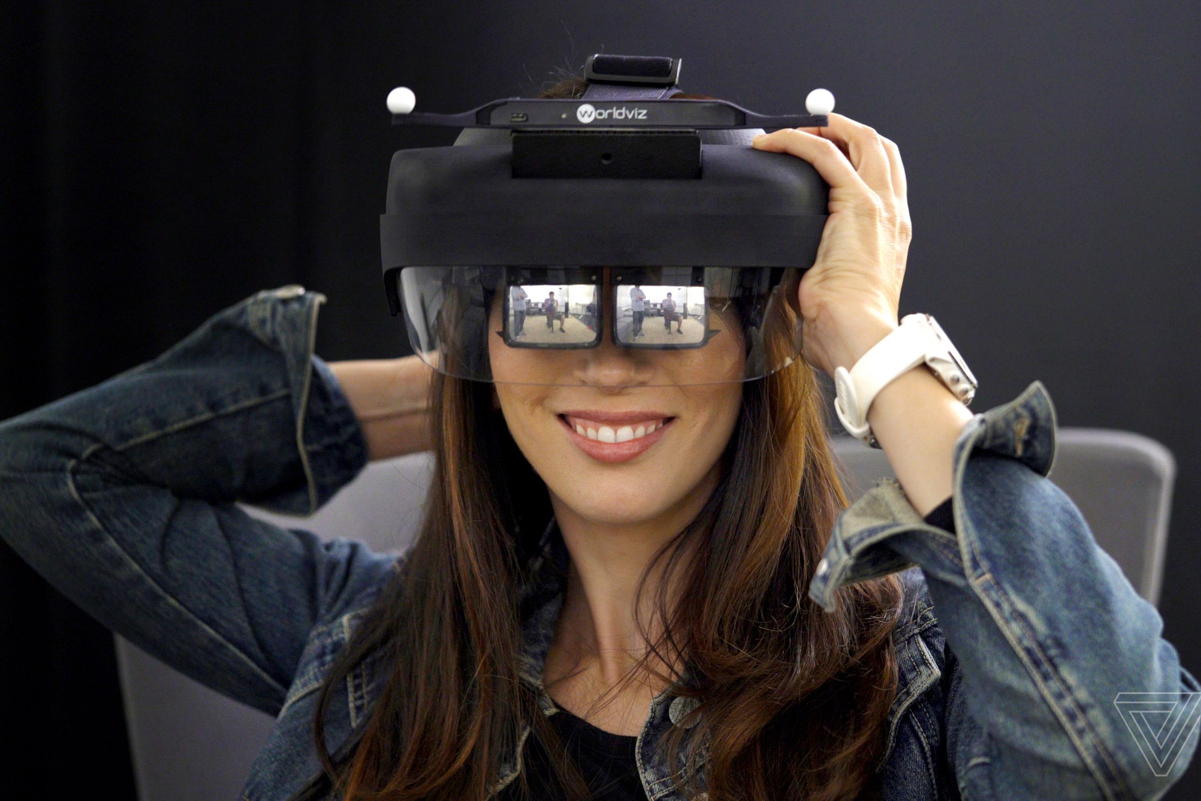 Woman wearing Avegant augmented reality headset