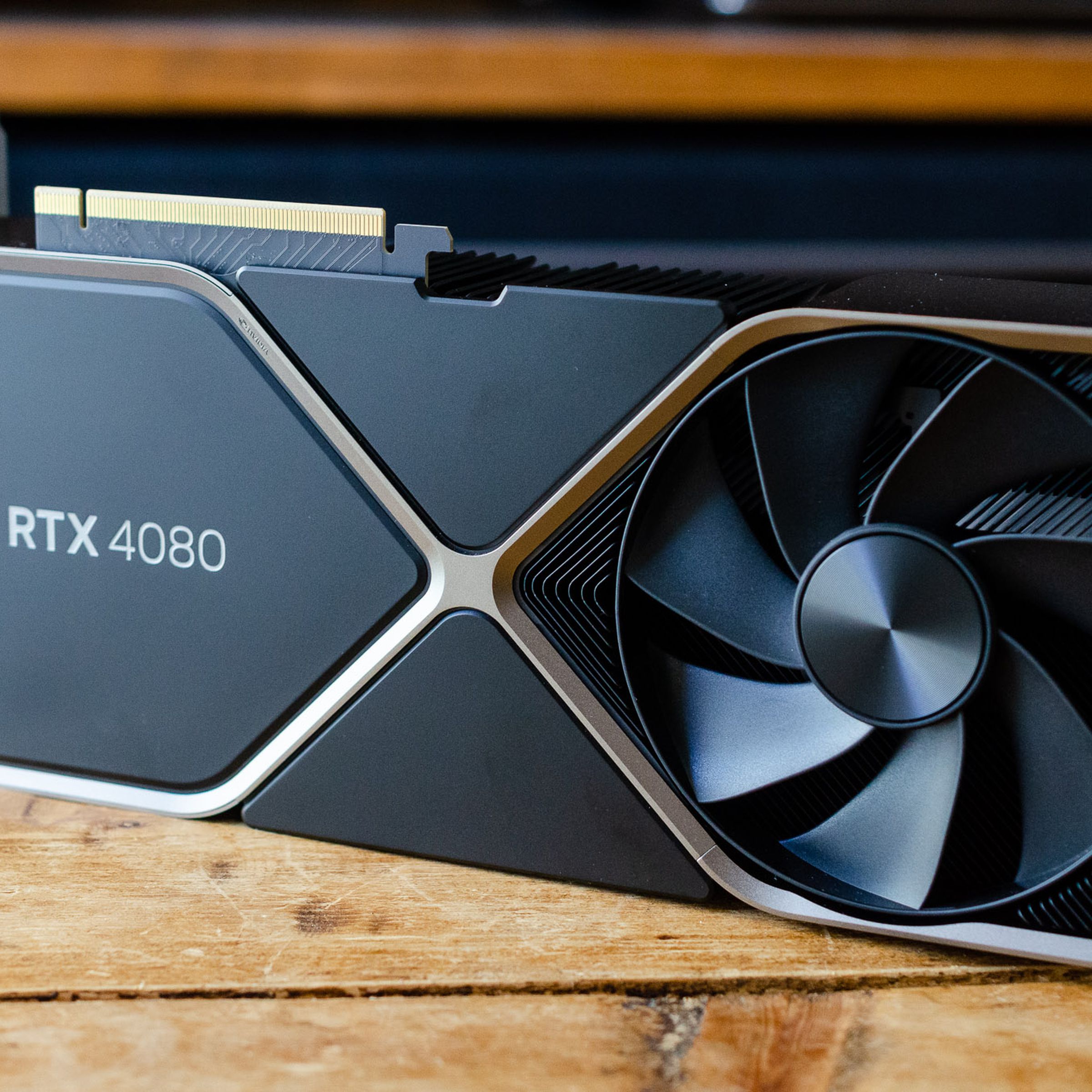 Nvidia’s RTX 4080 Founders Edition GPU on a wooden table