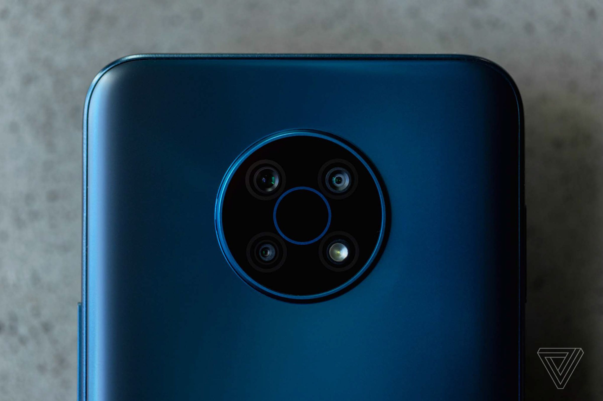You can tell this is a Nokia phone by its iconic circular array of three rear cameras on the back of the phone.