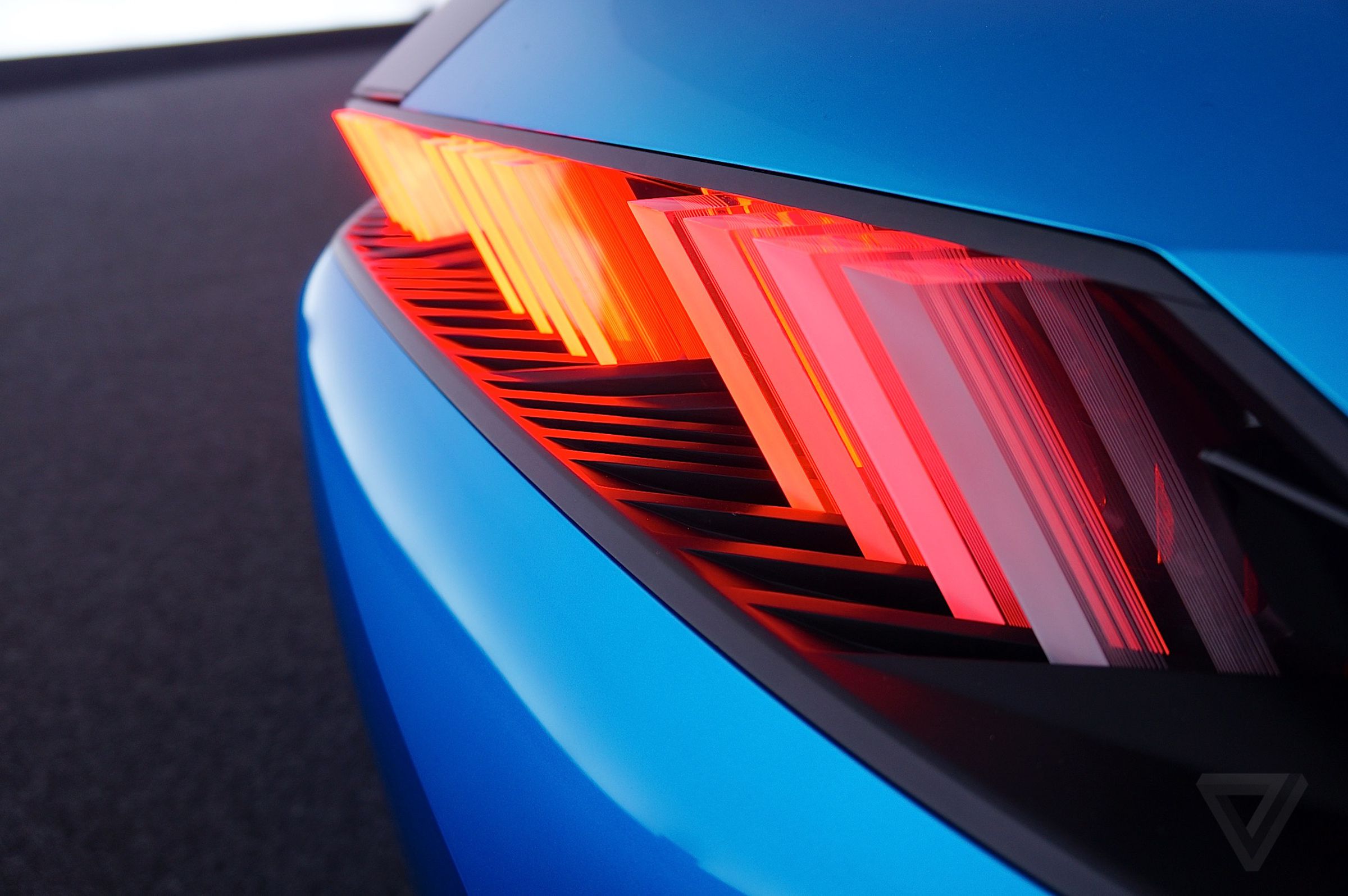 The taillights adopt the same linear pattern found throughout the car’s interior and exterior.