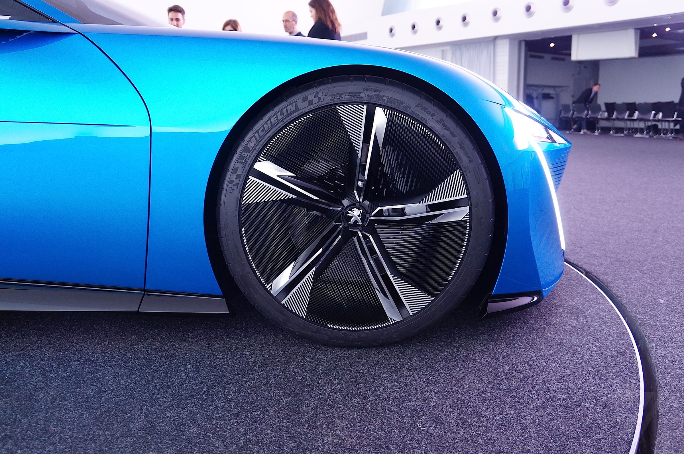 The car’s large, five-spoke wheels lend it an aura of power. 