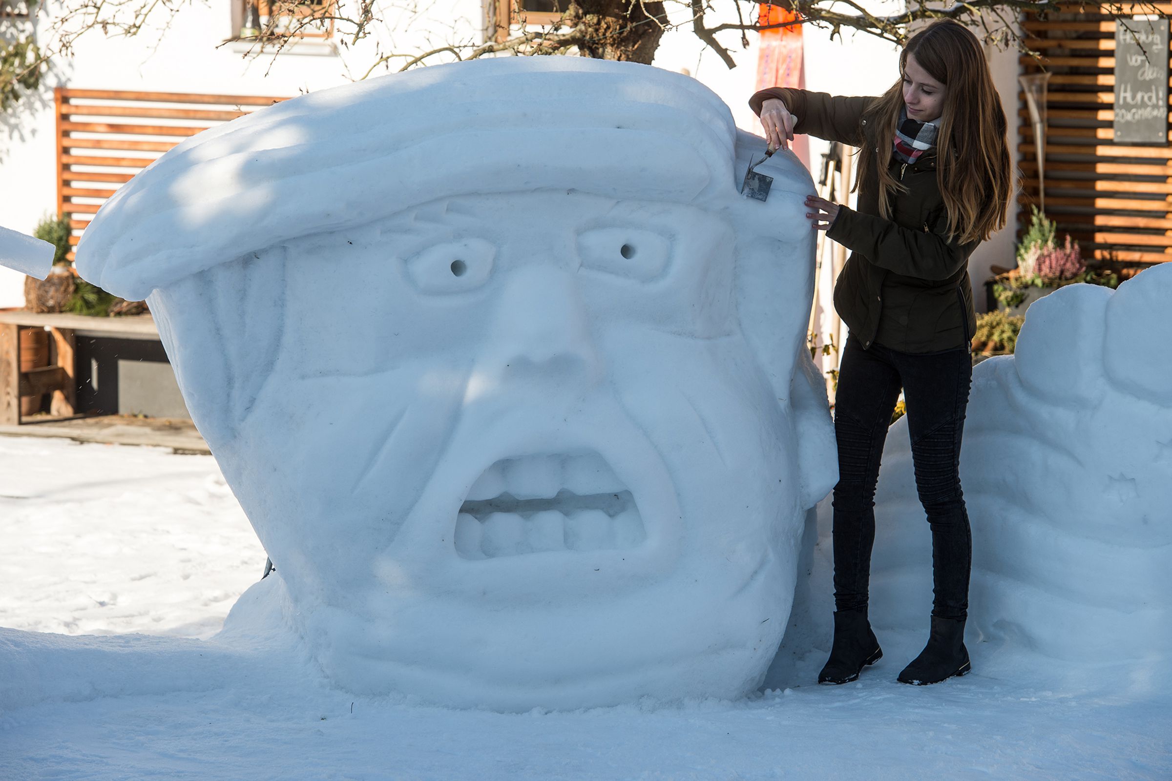 A snow portrait of Donald Trump sculpted by Magdalena Kammermeier in Germany, January 17, 2017. 