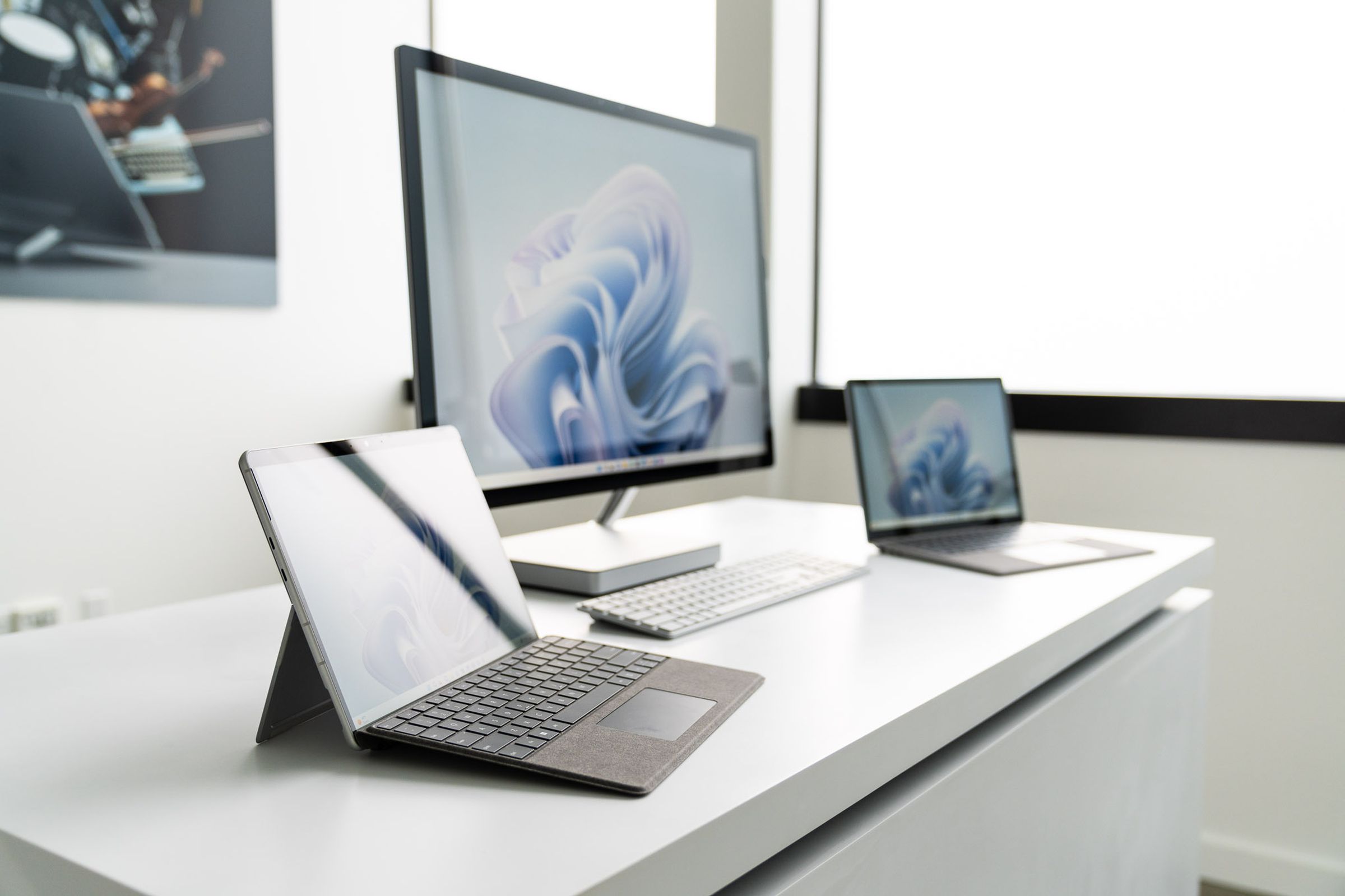 <em>The Surface Studio 2 Plus alongside the latest Surface Laptop and Pro devices.</em>