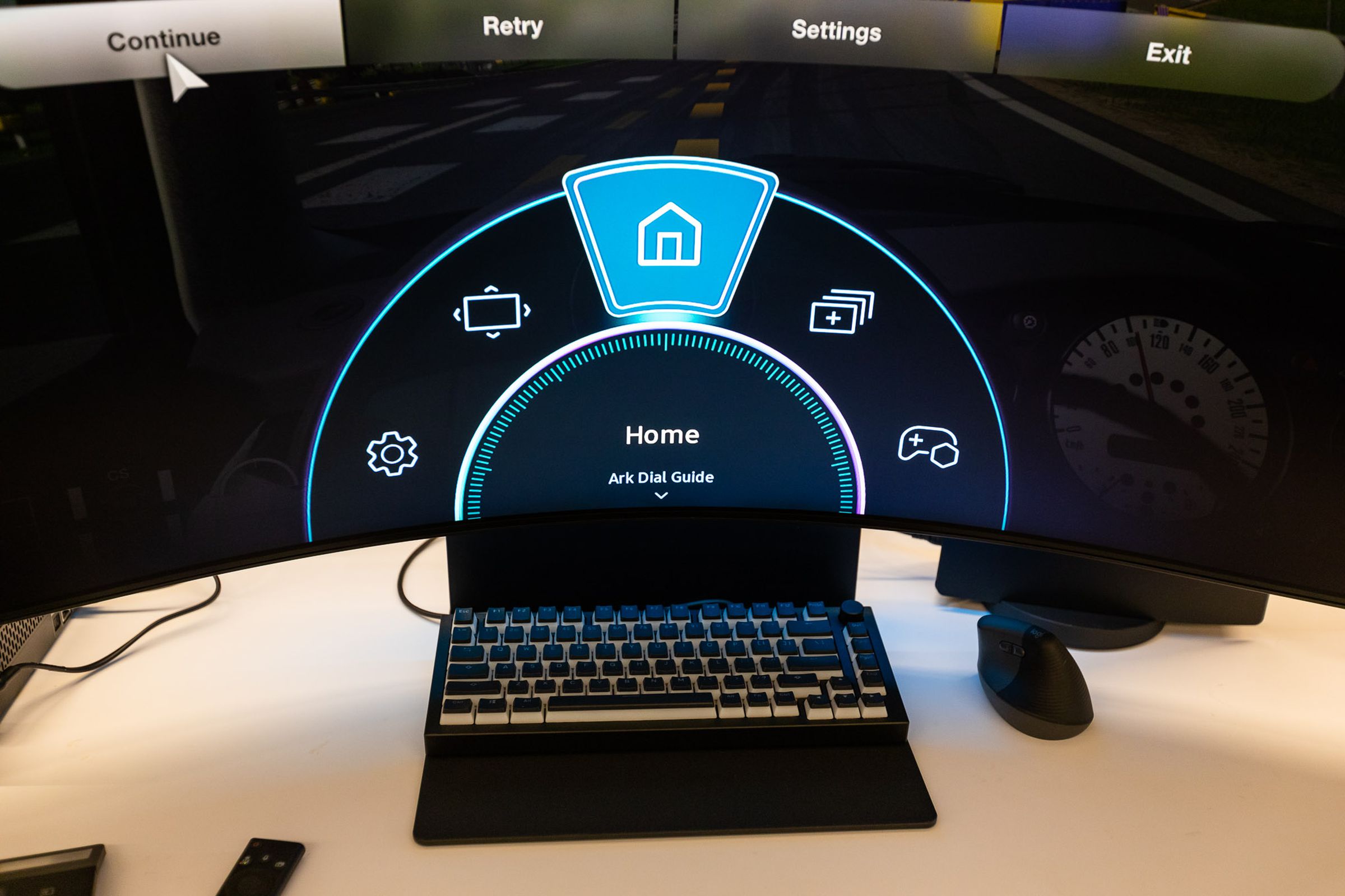 A menu displayed on the Samsung Odyssey Ark that shows icons for settings, the Samsung Gaming Hub, Multi View mode, the Game Bar, and Flex Move.