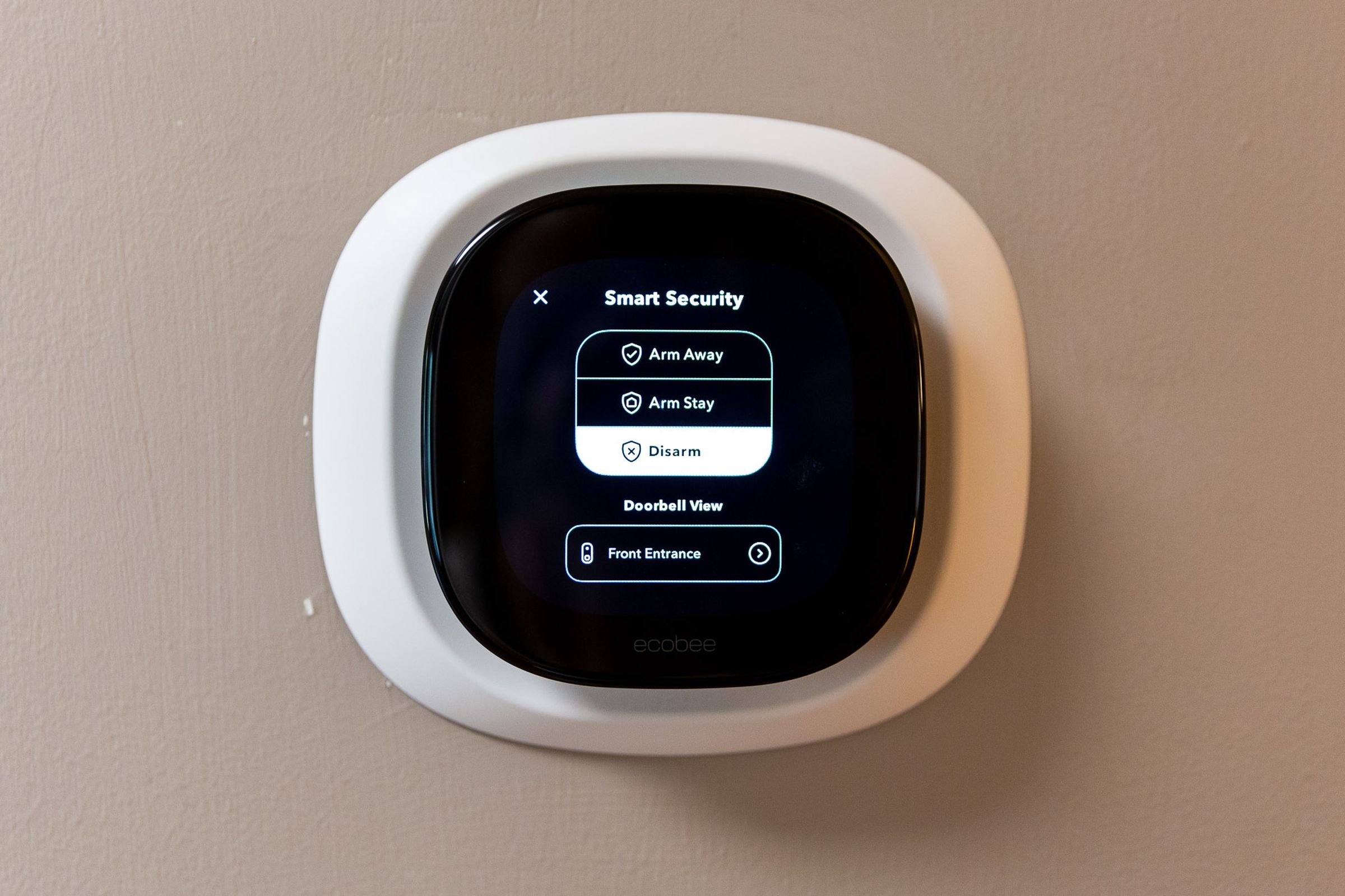 <em>You can use the thermostat screen to arm and disarm the security system.</em>