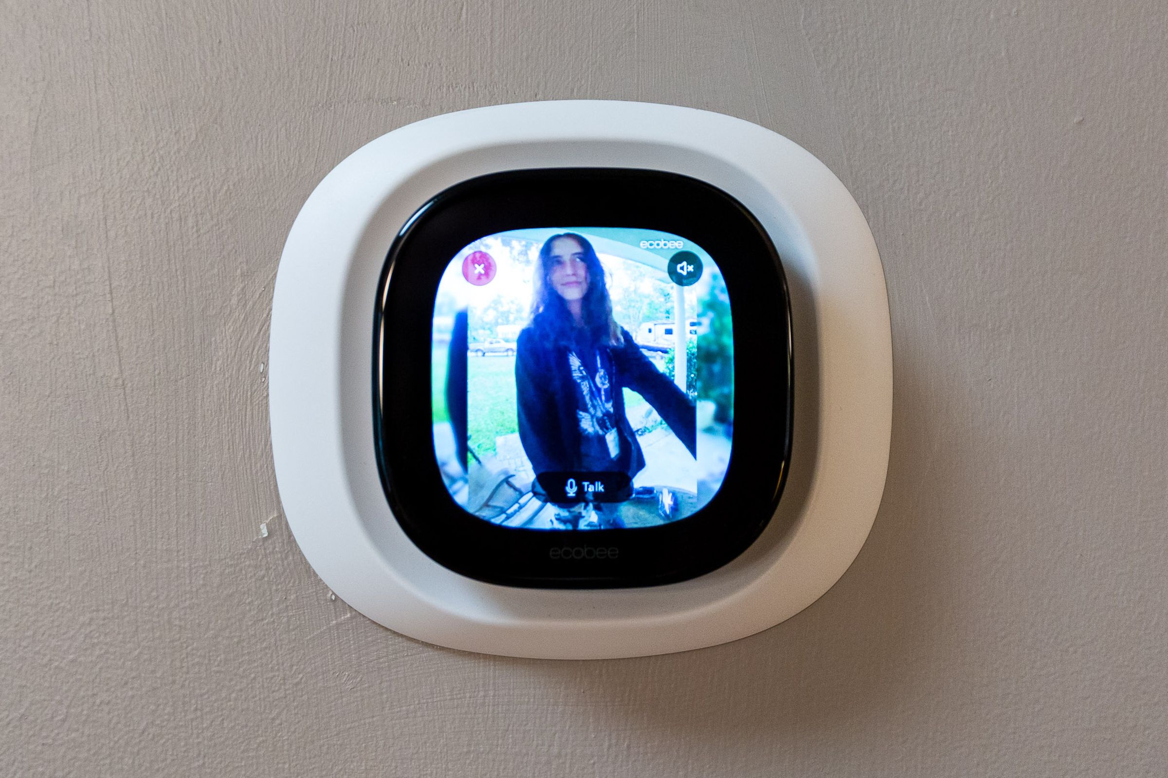 <em>The Smart Thermostat Premium showing a live feed of the doorbell camera.</em>