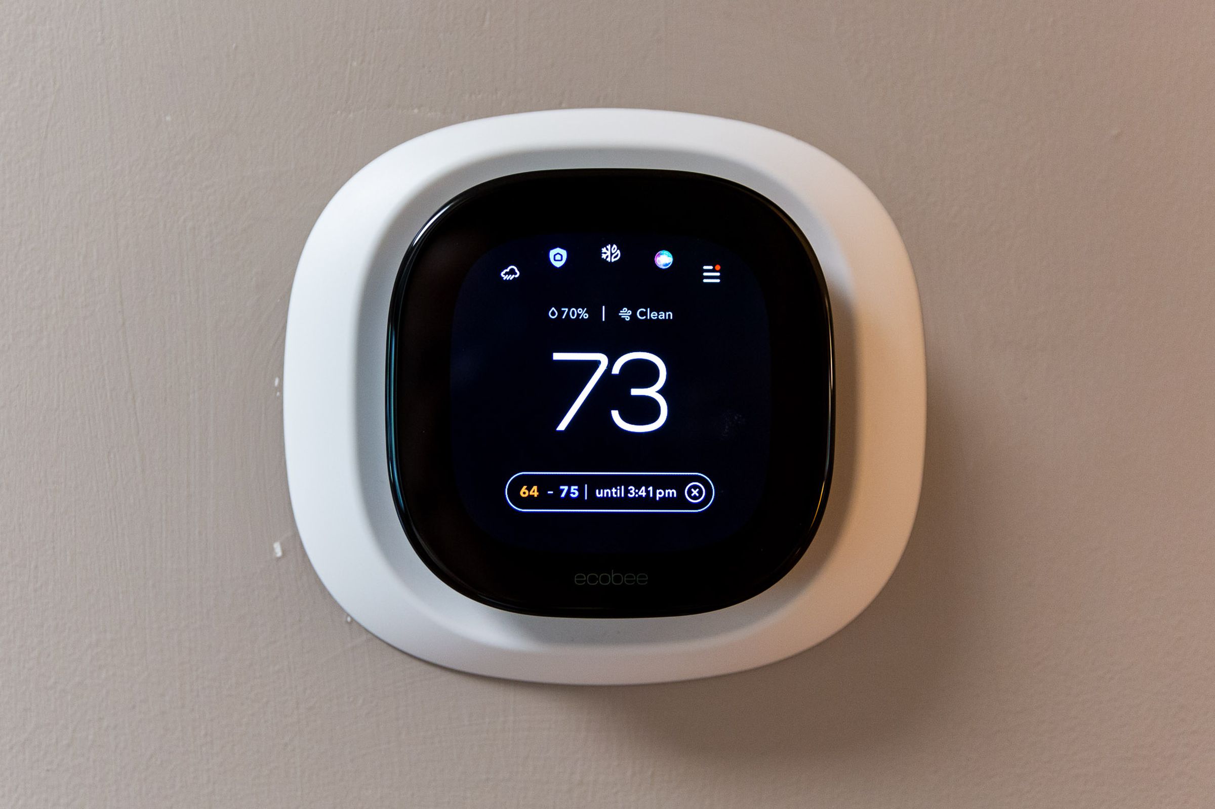 <em>The thermostat interface now has a new icon for security, second from left.</em>