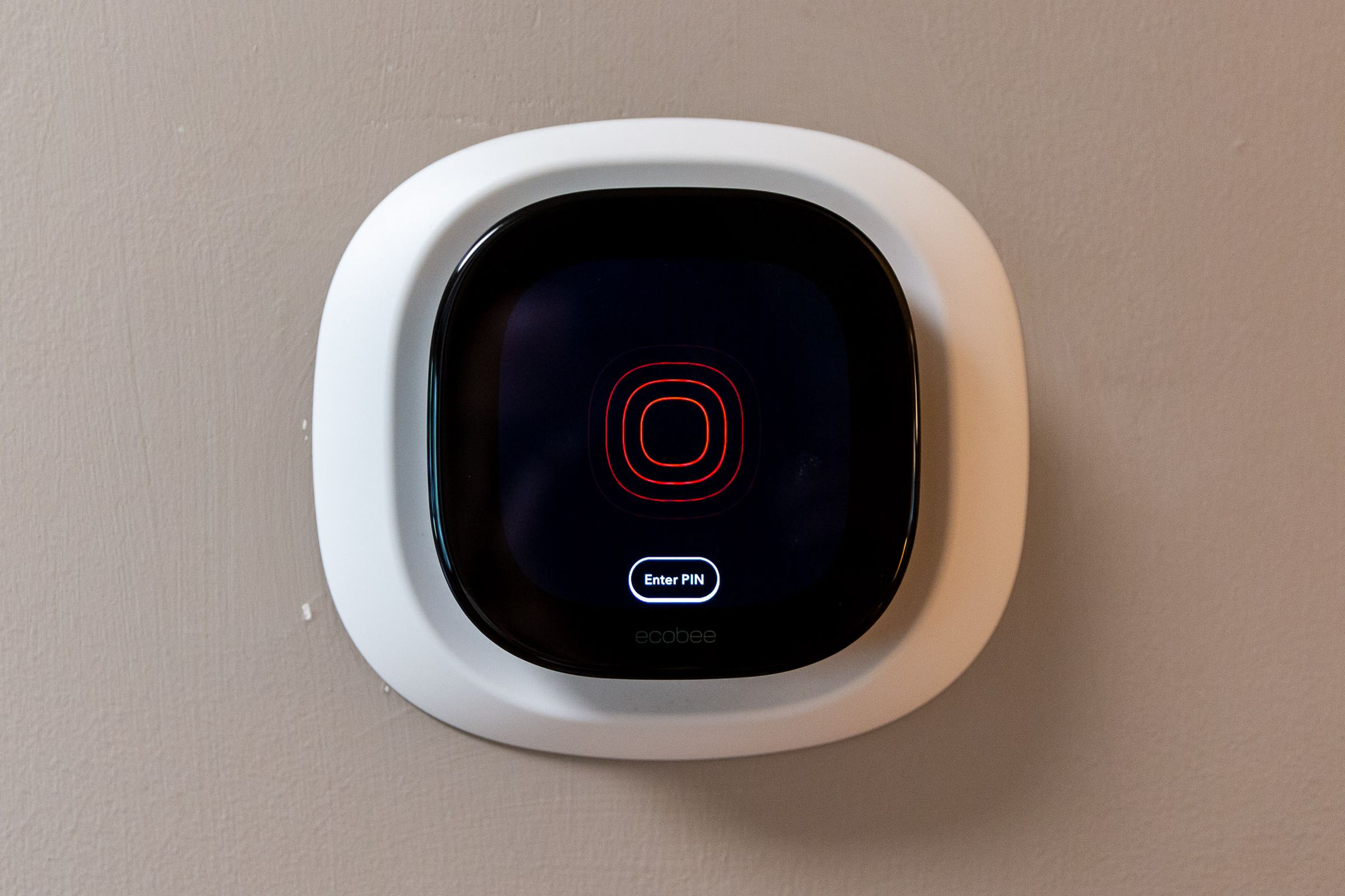 <em>The thermostat sounding a siren when the security system is triggered</em>