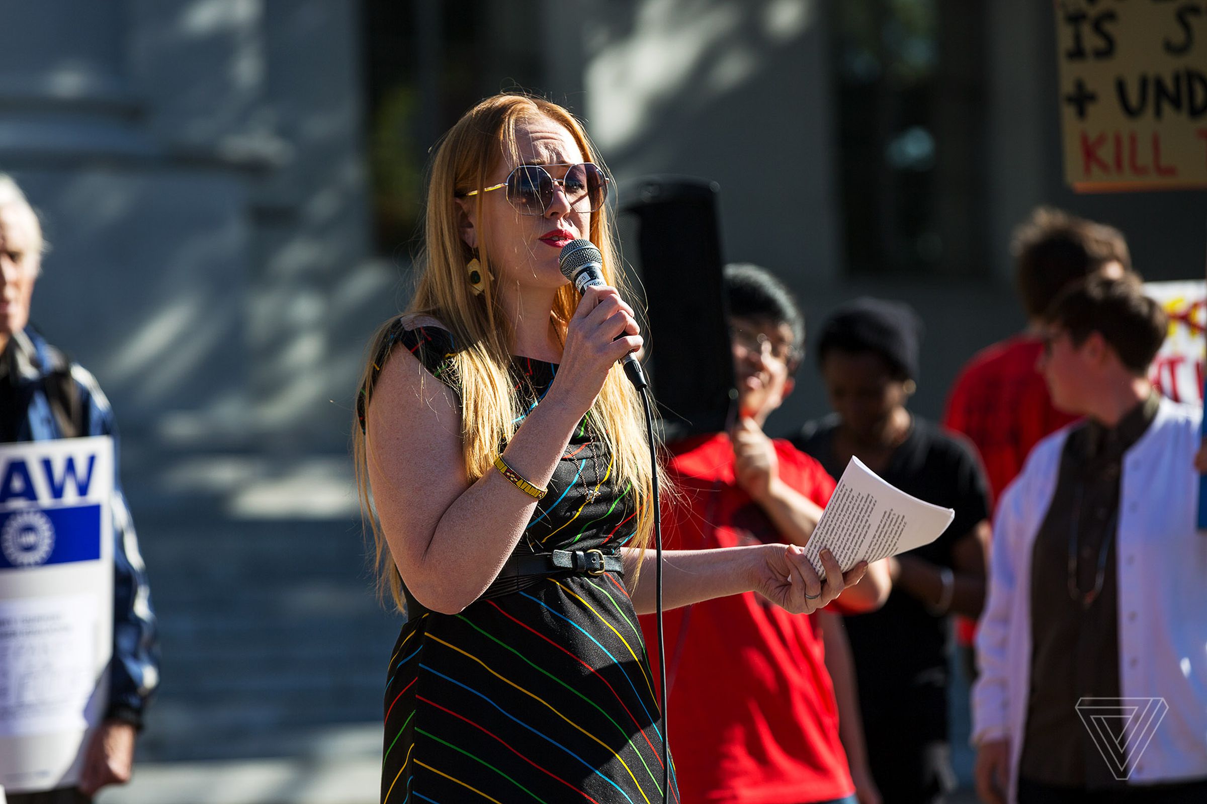 Lydia Majure, a postdoctoral neuroscientist, addressed the crowd at Wednesday’s protests. Taxing grad student tuition waivers “would be terrible for education and for research,” she says. “A lot of breakthroughs wouldn't happen because of it.”
