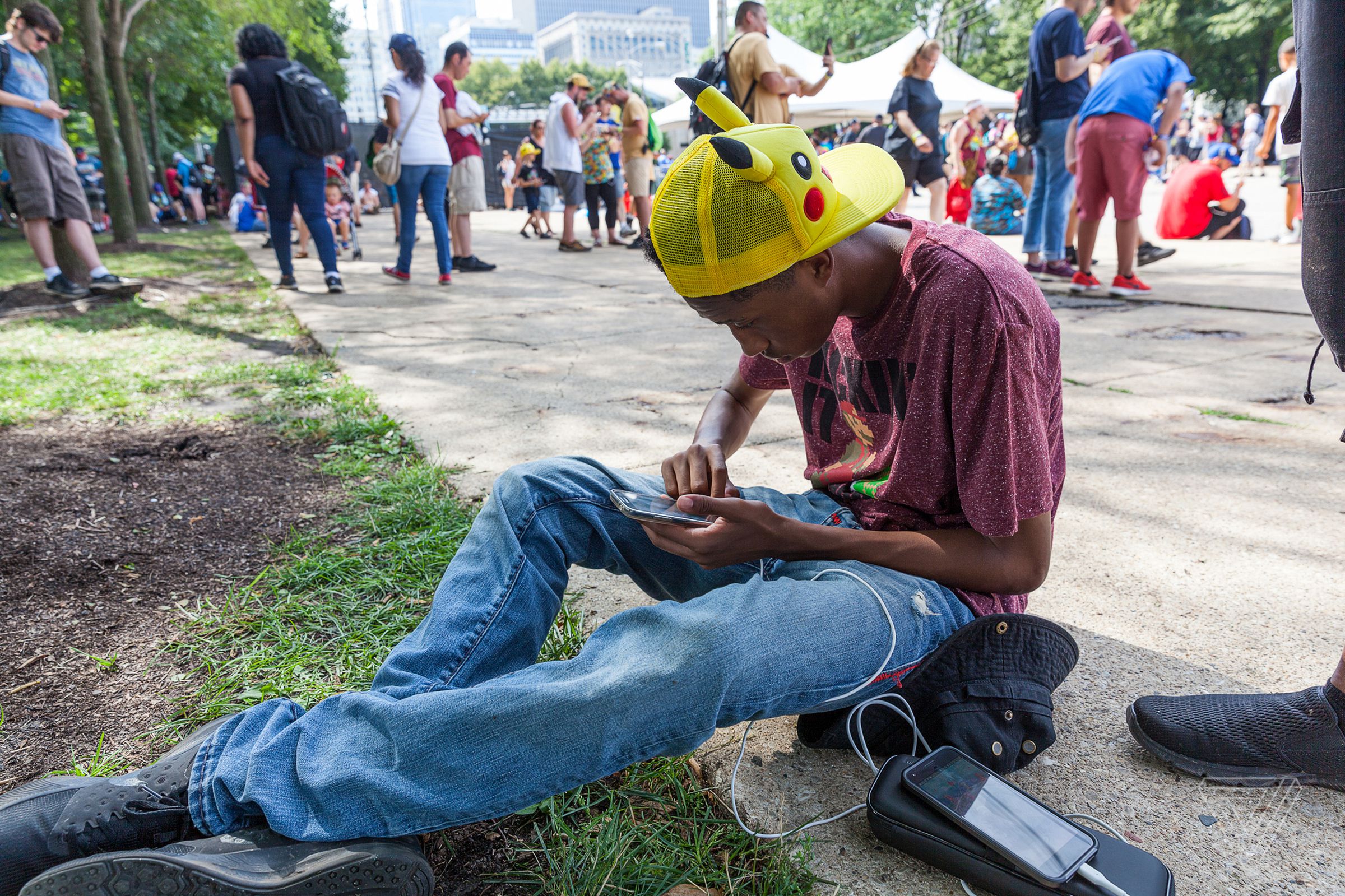 A Trainer by the entrance deep in concentration