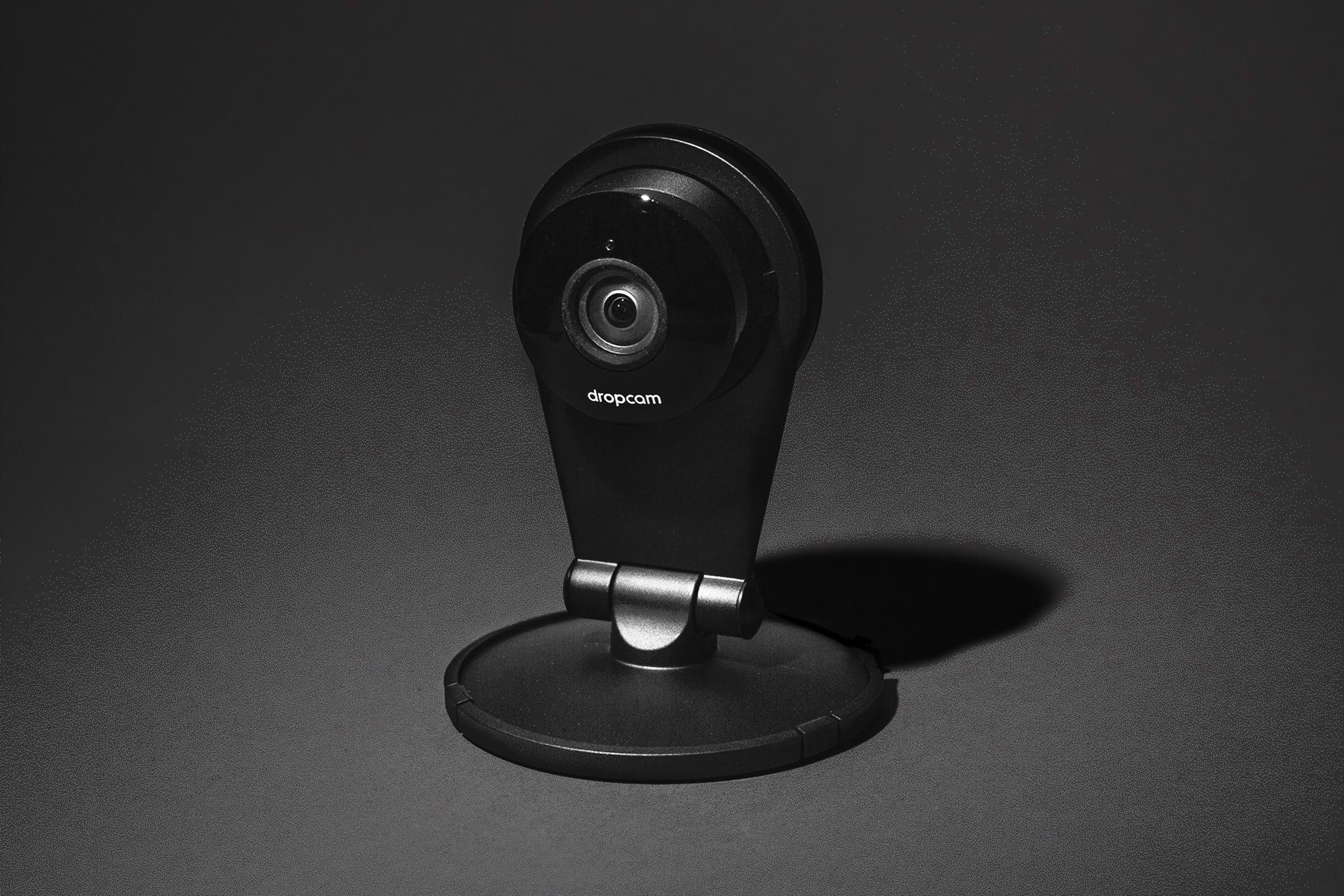 Moody photo of Dropcam on a black background
