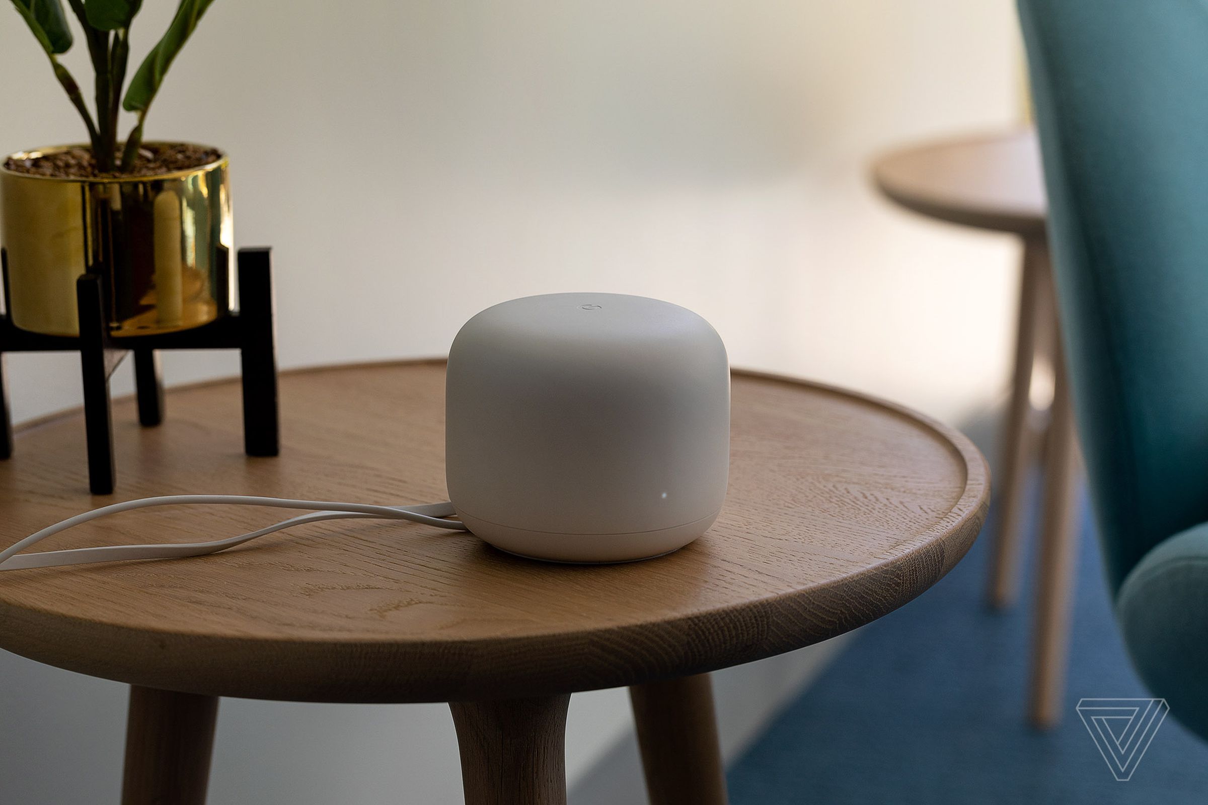 Google Home device on a side table.