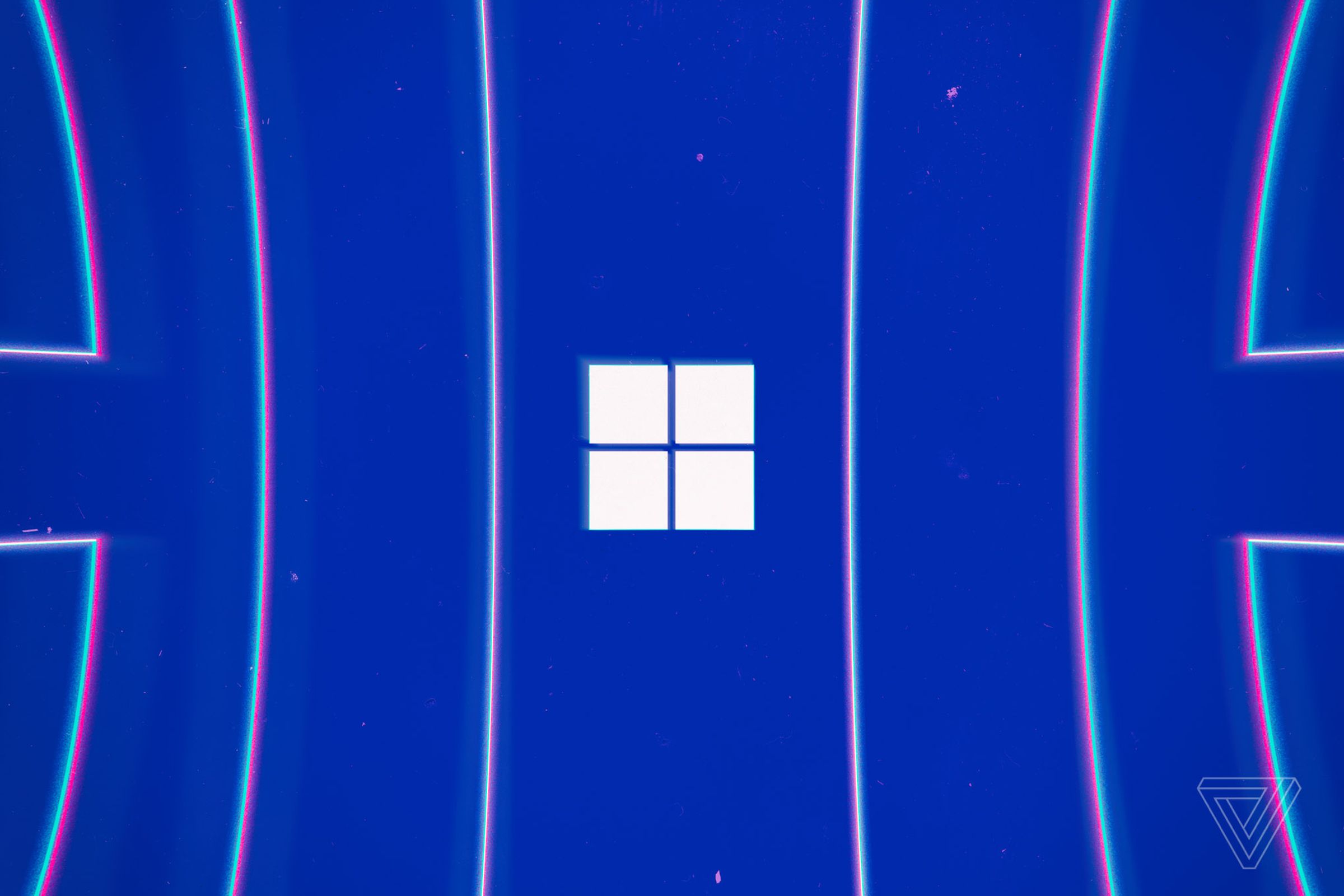 Windows logo on a blue background with several vertical lines flanking it.