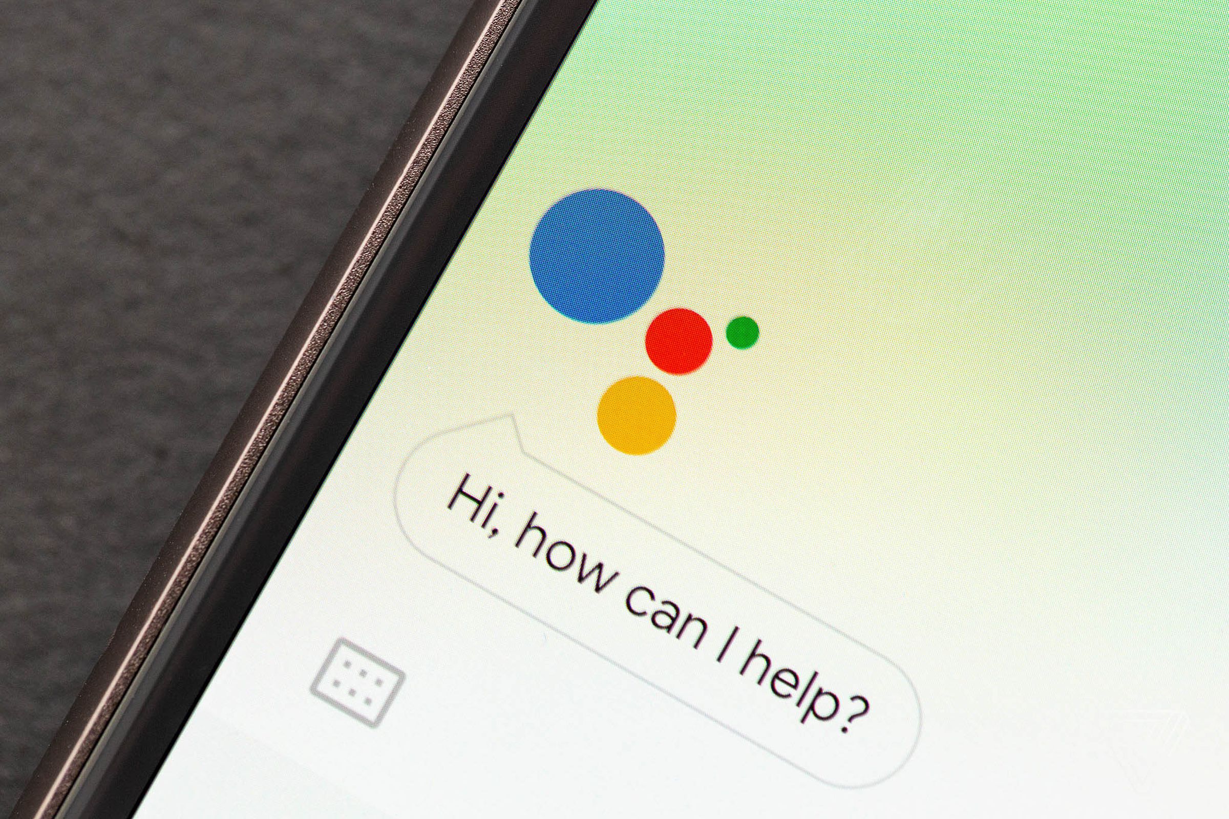 An image of the Google Assistant user interface asking “Hi, how can I help?”