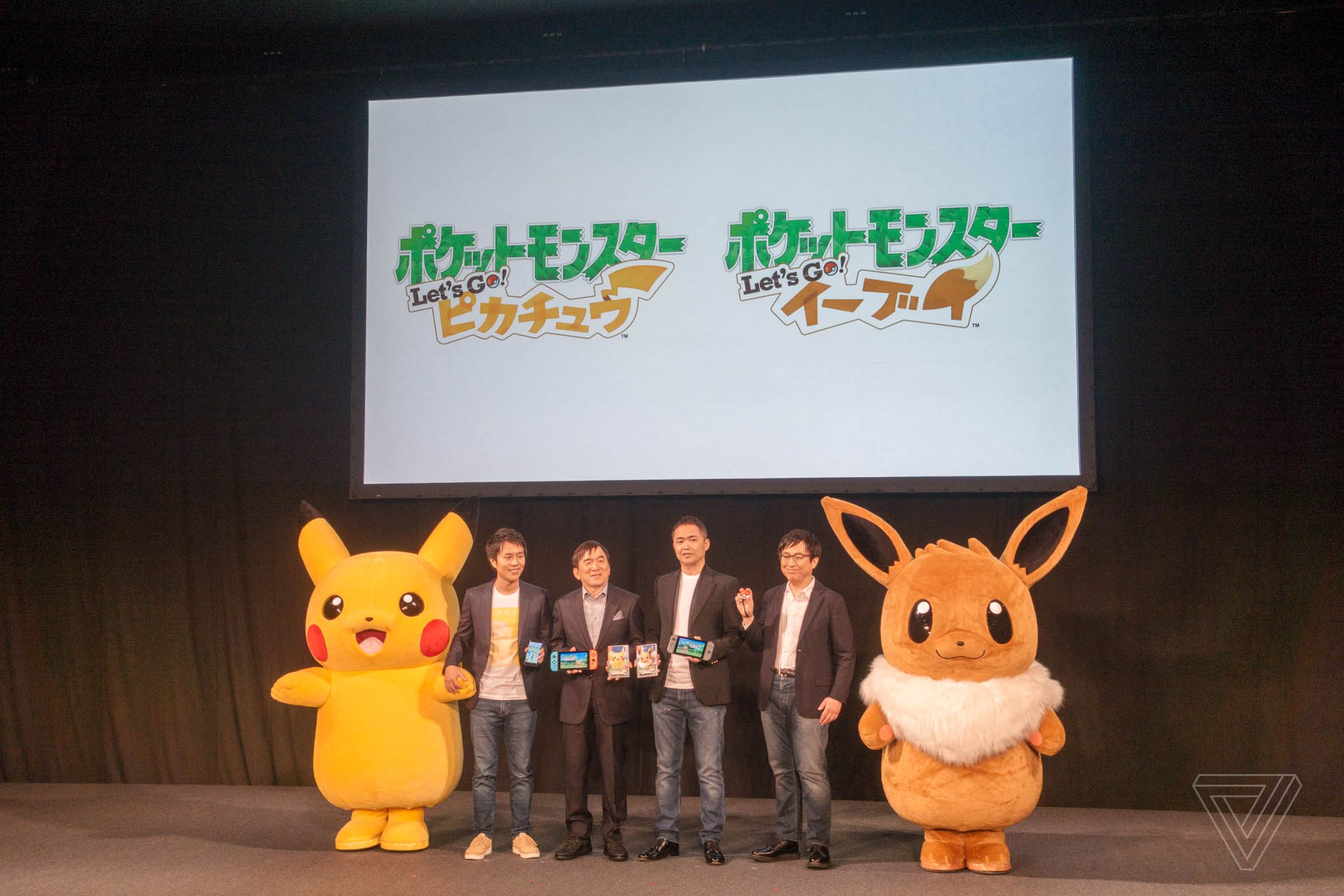 Executives from Niantic, The Pokemon Company, Game Freak, and Nintendo on stage in Tokyo today
