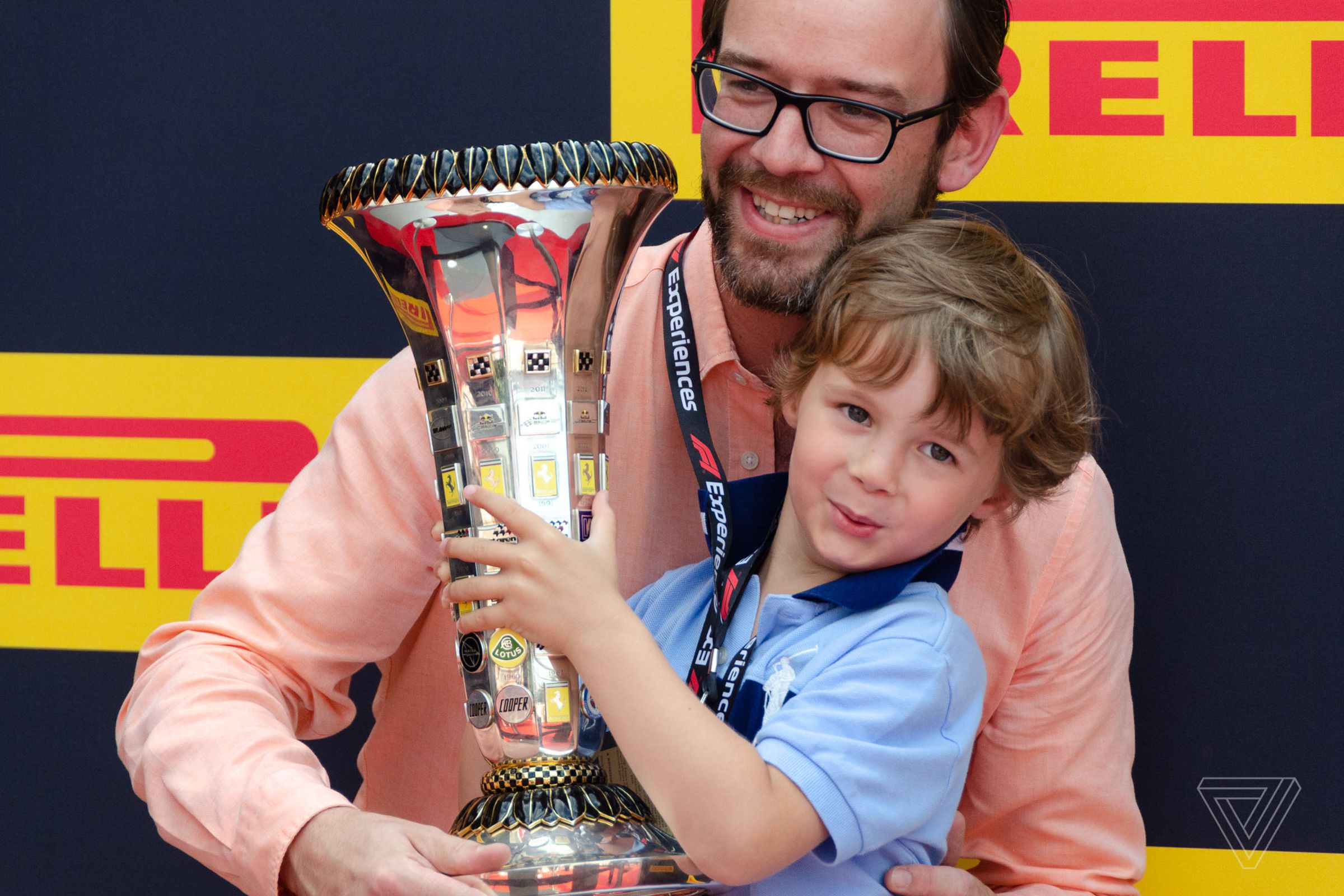 Part of the VIP fan treatment at the French Grand Prix is having your picture taken with a replica trophy.