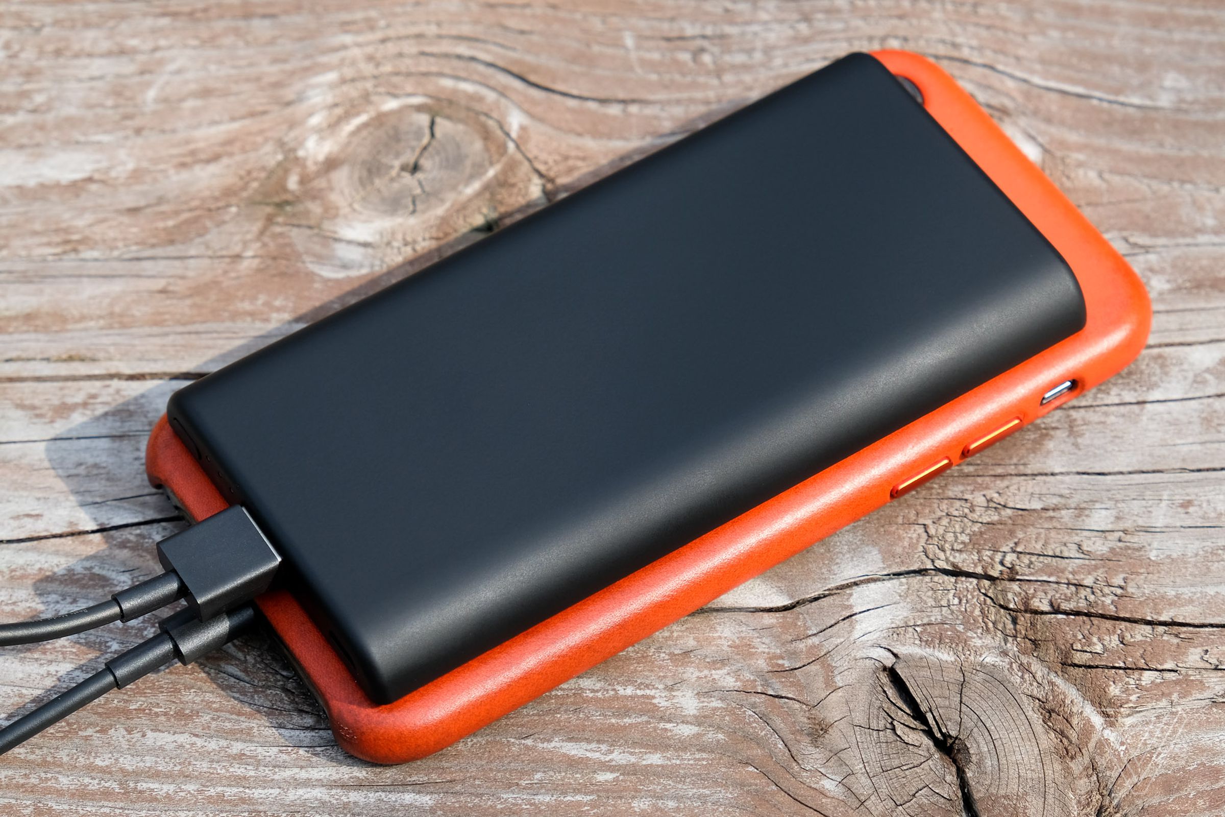 The Anker PowerCore Slim 5000 and an iPhone X.