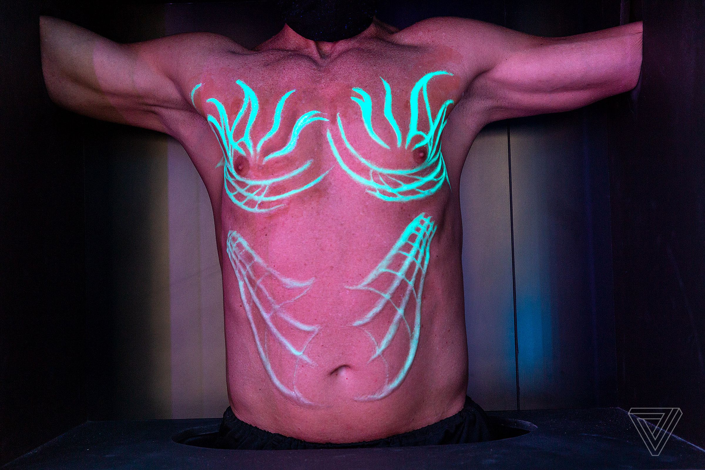 Carnaval, made up of “blacklight implants” is displayed on a live model at the A. Human exhibit.