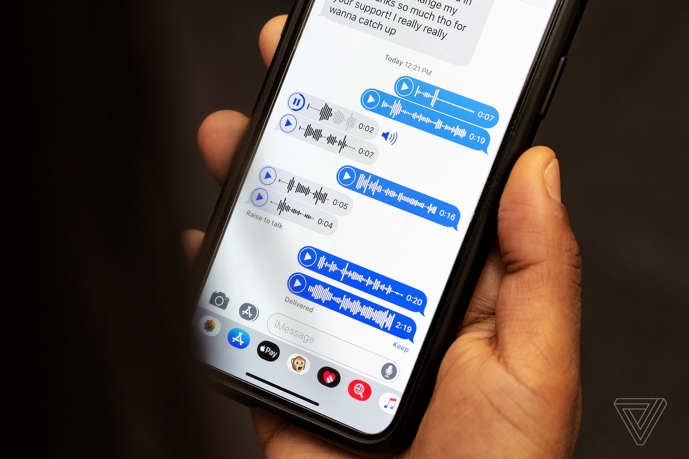 A photo showing someone use iMessage to record a voice message.