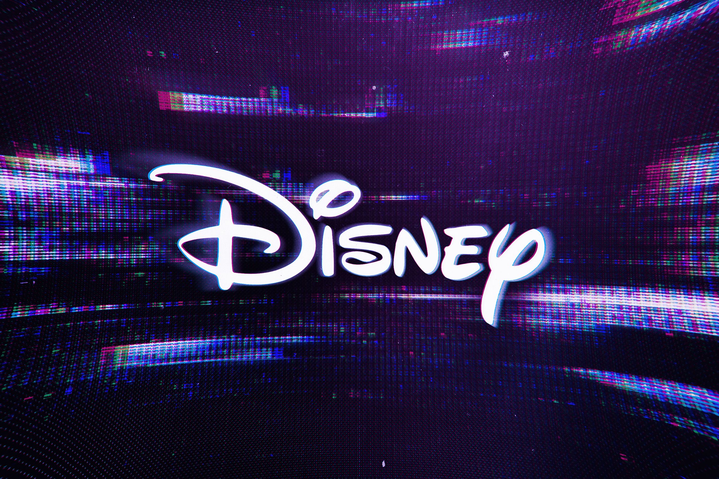 The Disney name written in white on a mostly purple background.