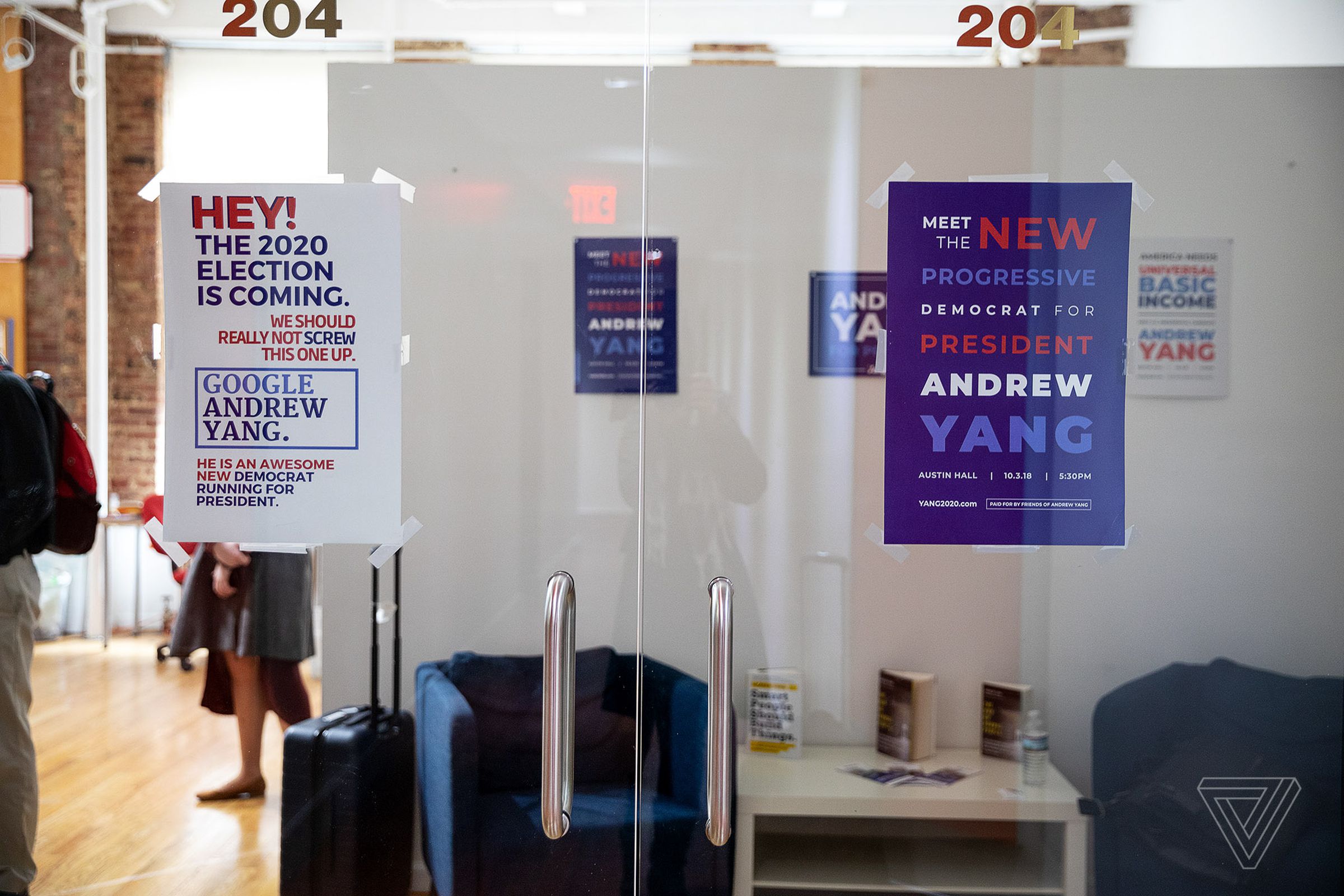 One of Yang’s campaign posters tells curious voters to “Google Andrew Yang.”