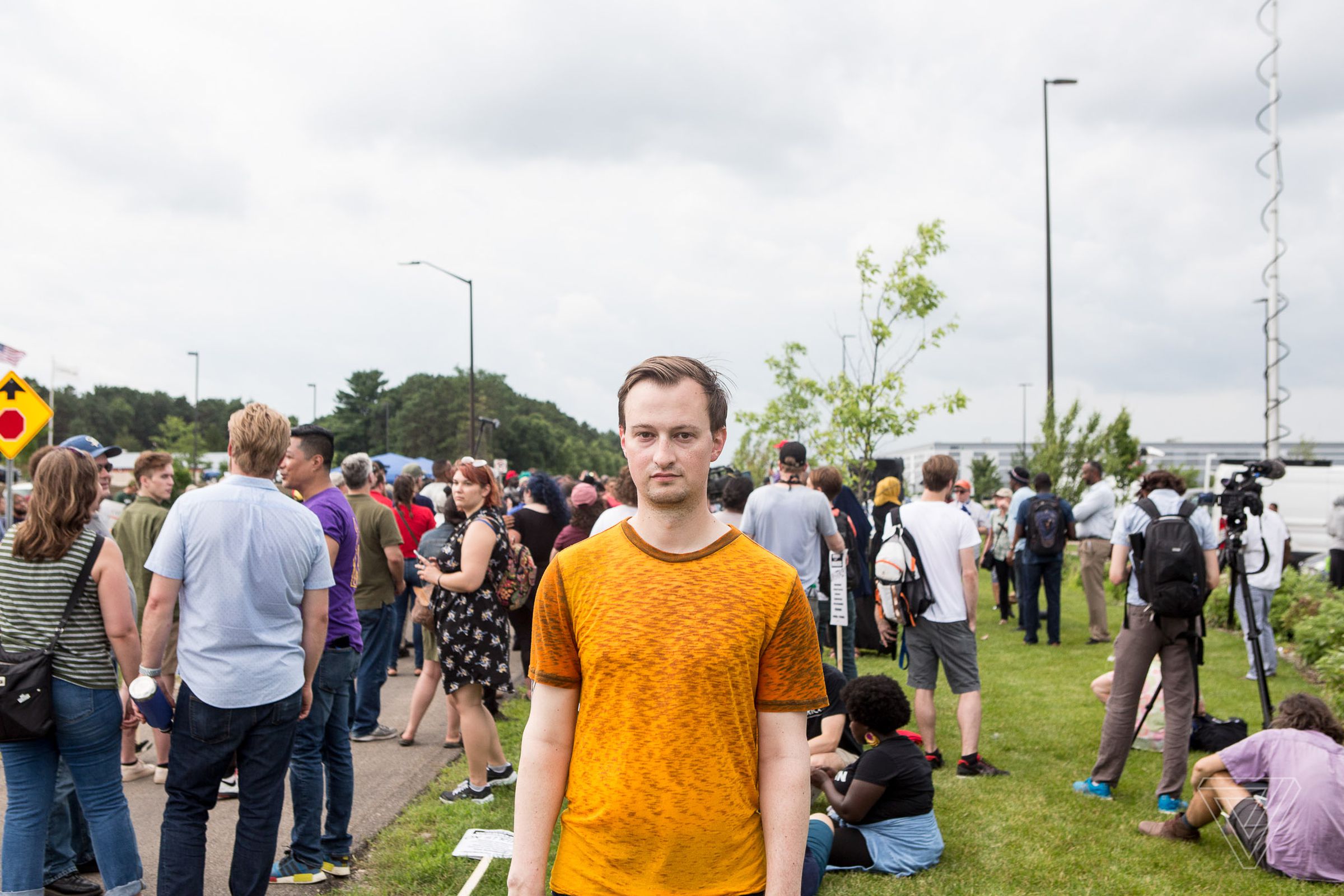 A portrait of Weston Fribley, a software engineer in Seattle, outside of the Amazon Fulfillment Center on Prime Day in Shakopee, Minn., on Monday, July 15th, 2019.