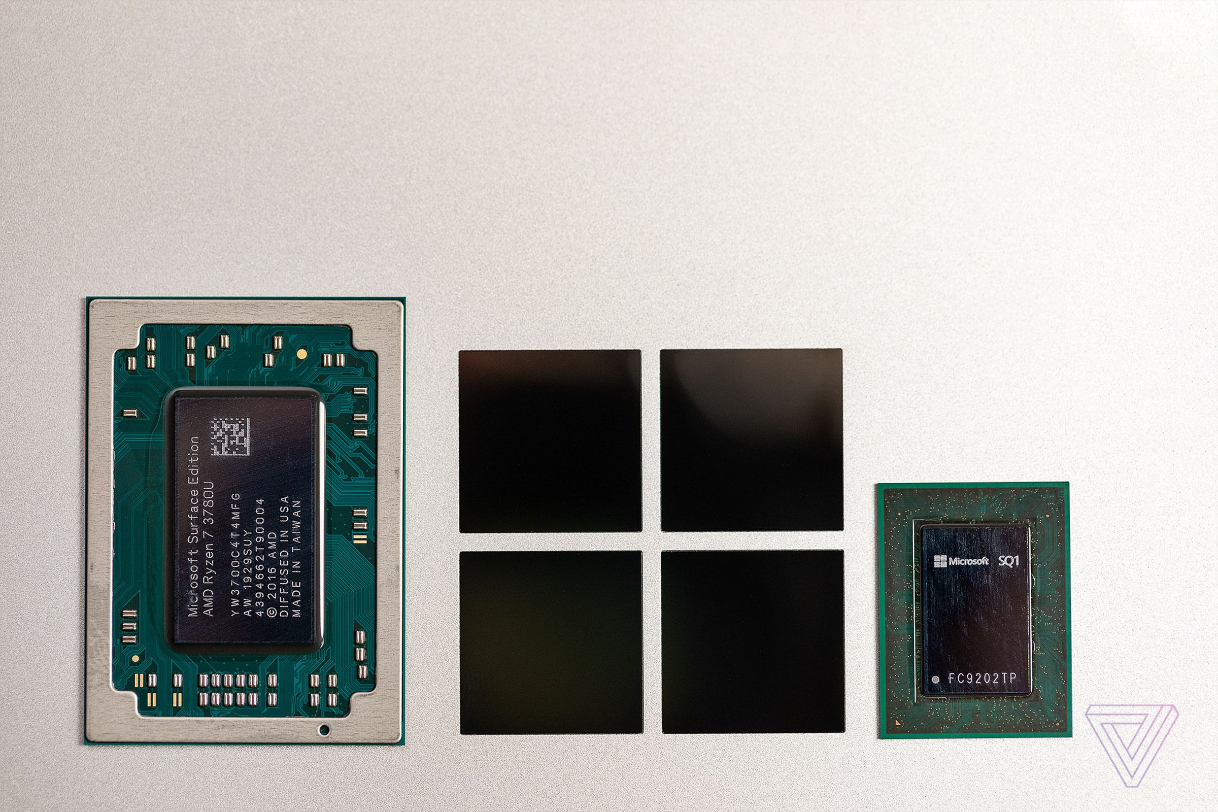 Microsoft’s custom SQ1 Qualcomm chip for the Surface Pro X (right).