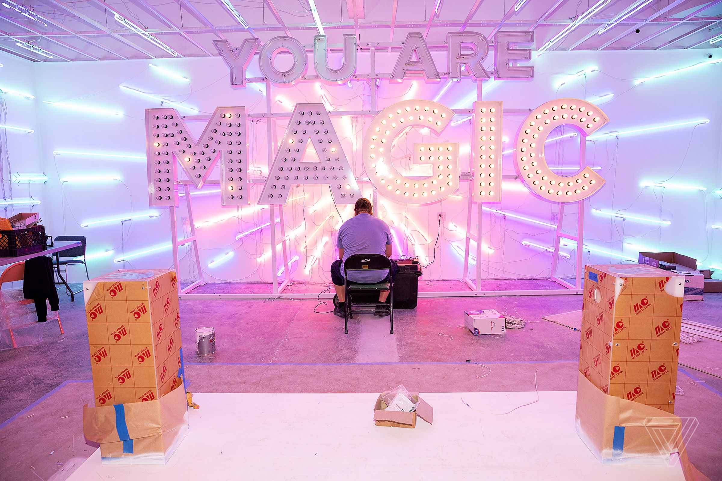 Installation in progress of “Your Magic is Real” by Alicia Eggert & James Akers.