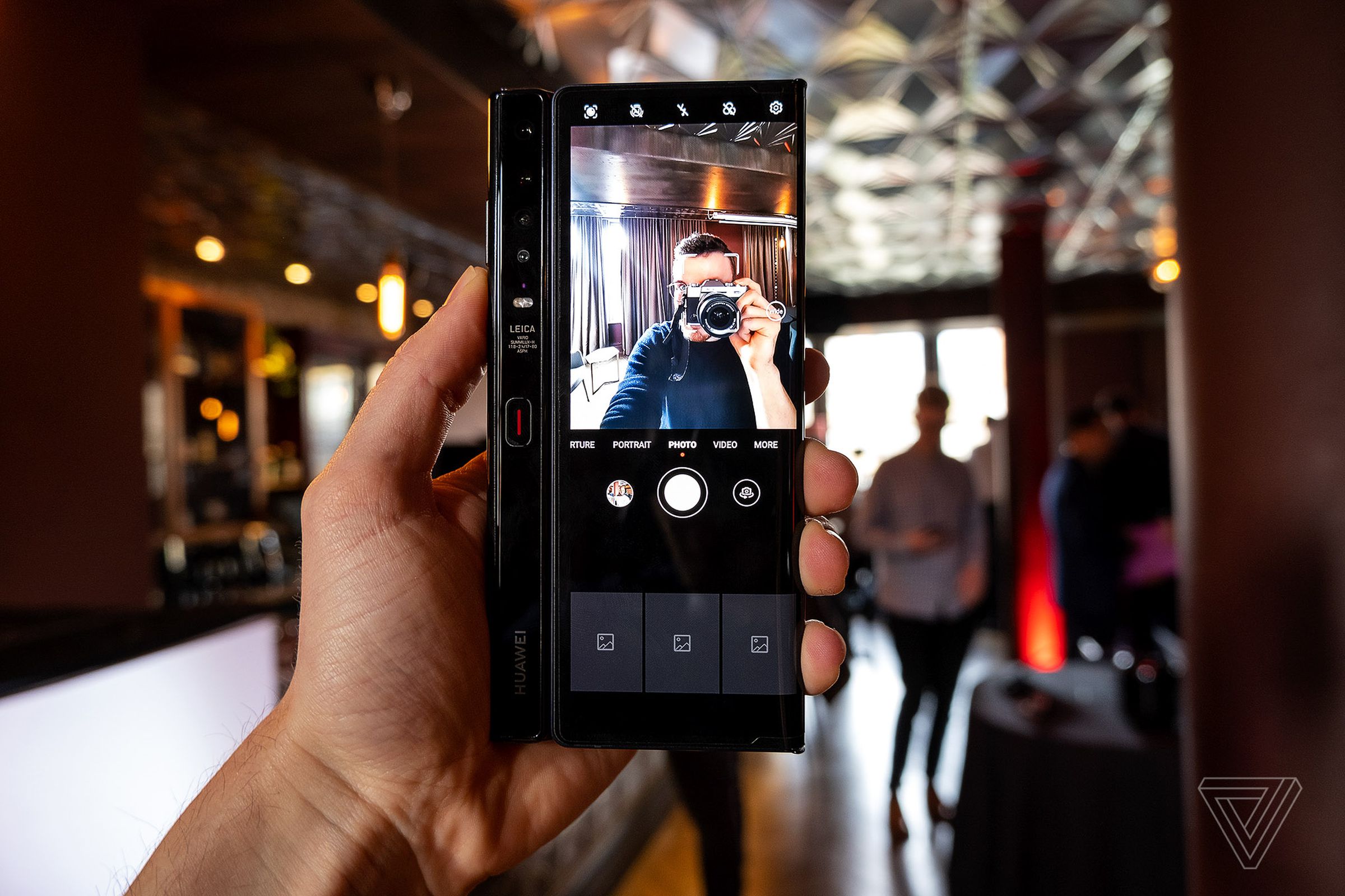 The Mate Xs has a quad-camera array on its rear that can also be used for selfies.