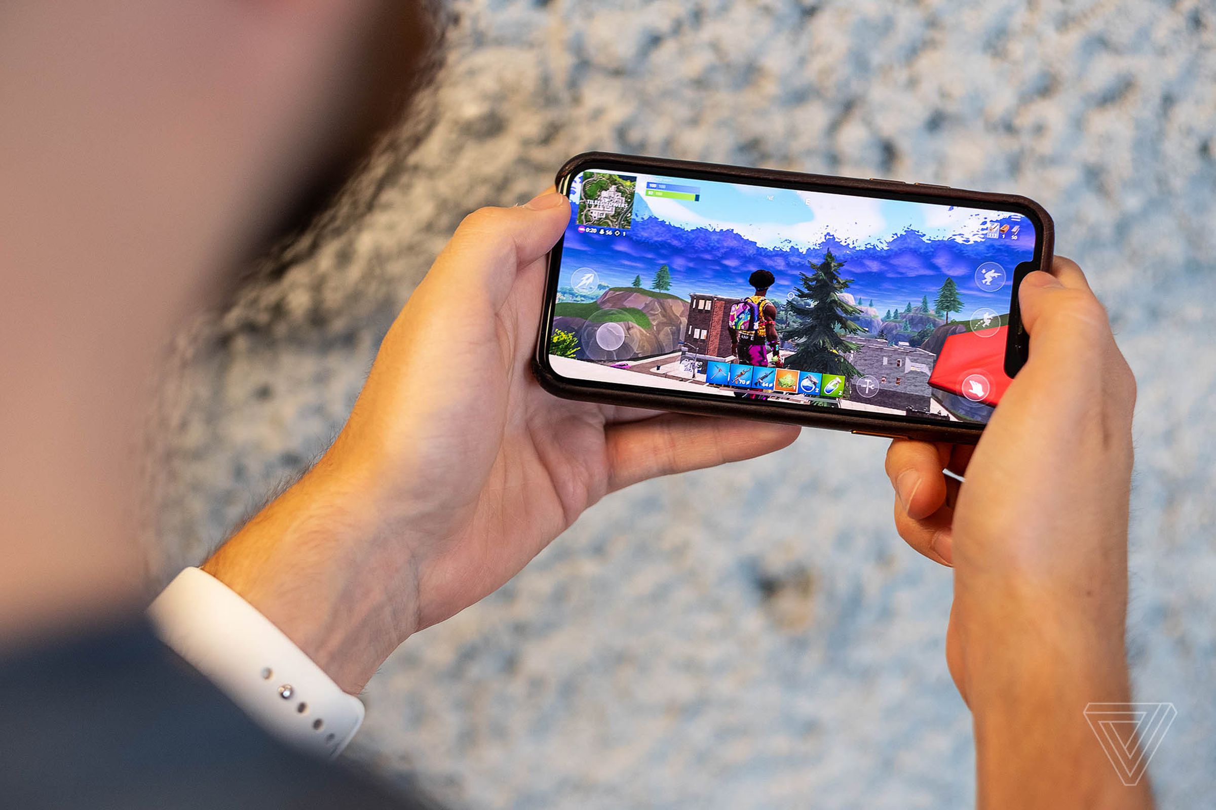 Fortnite running on an iPhone, which is something you currently can’t do.