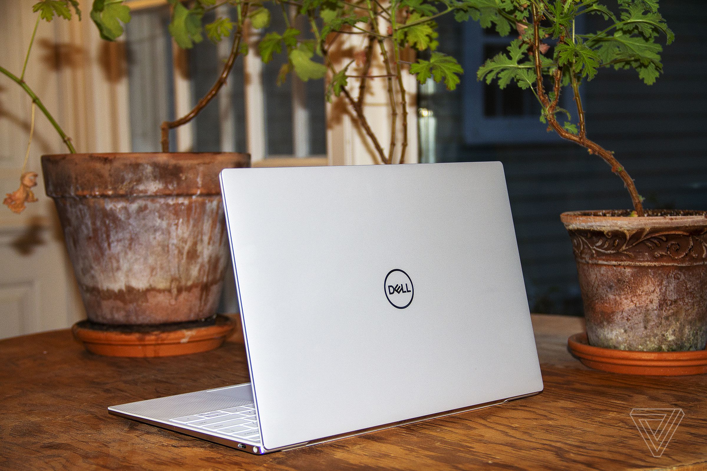 The Dell XPS 13 from the back, angled to the left.