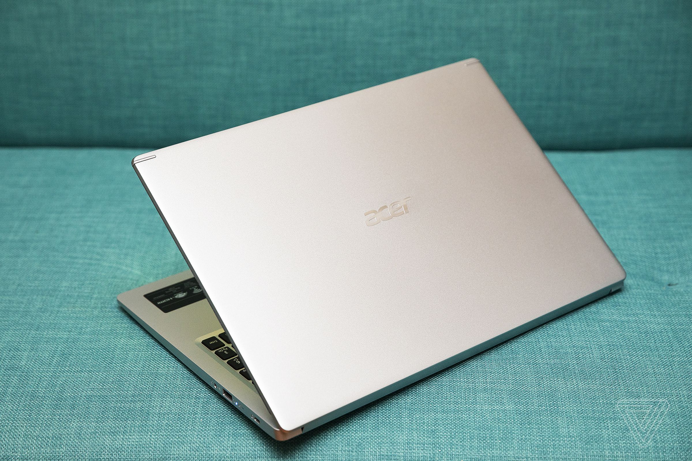 The Acer Aspire 5 from the back, half open.